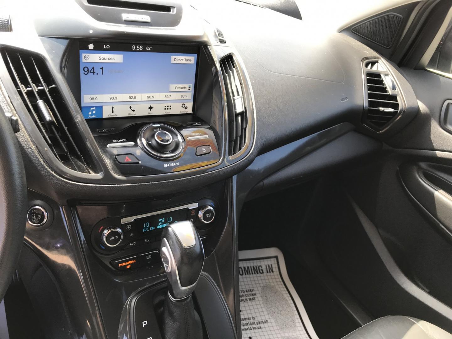 2016 Black /Black Ford Escape Titanium 4WD (1FMCU9JX2GU) with an 1.6L L4 DOHC 16V engine, 6-Speed Automatic transmission, located at 577 Chester Pike, Prospect Park, PA, 19076, (610) 237-1015, 39.886154, -75.302338 - 2016 Ford Escape Titanium: Only 109k miles, backup camera, sunroof, new PA inspection, SUPER CLEAN, runs LIKE NEW! This vehicle comes inspected and has been given a bumper to bumper safety check. It is very clean, reliable, and well maintained. We offer a unique pay plan that is known for being t- Photo#14