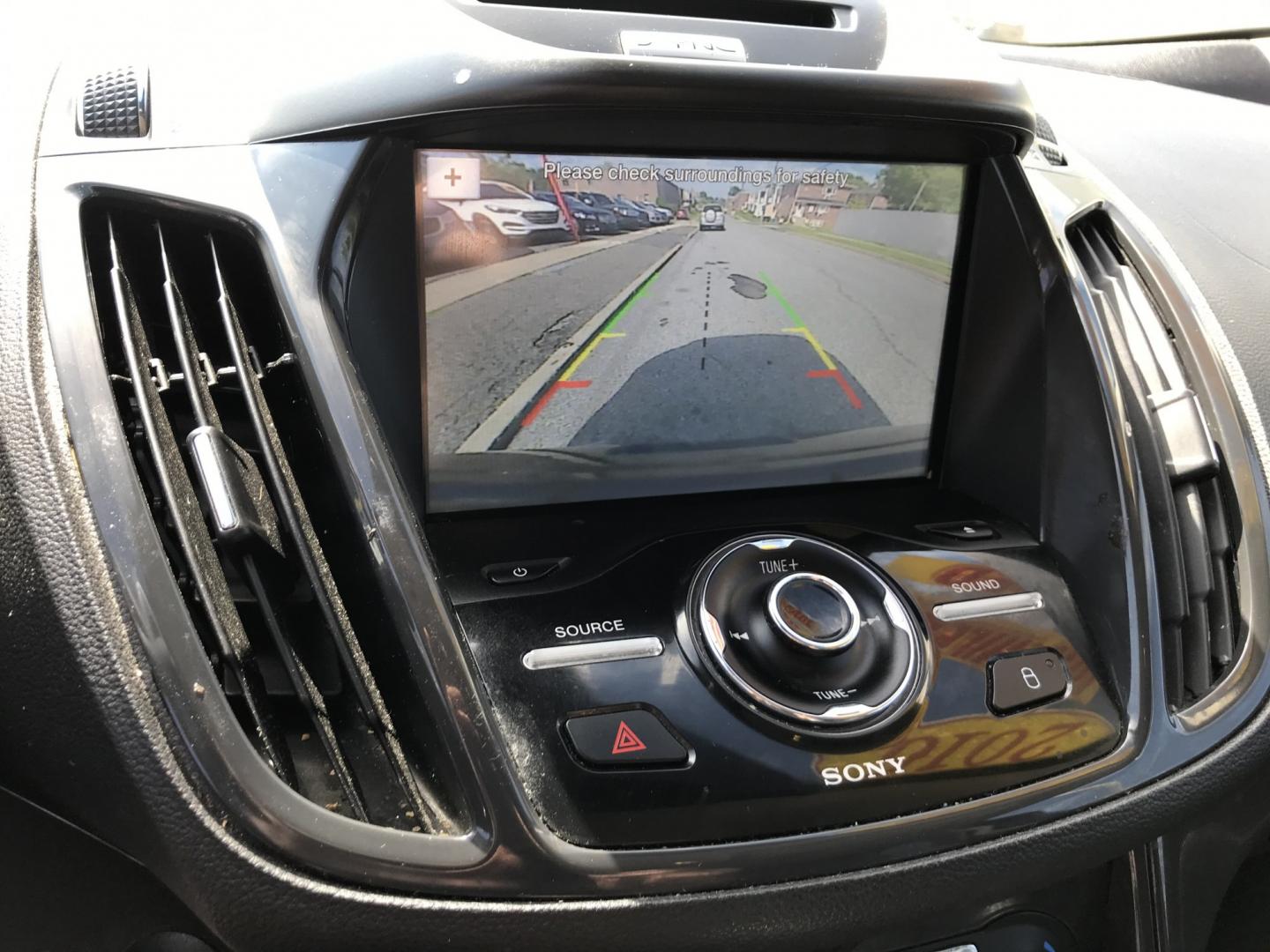 2016 Black /Black Ford Escape Titanium 4WD (1FMCU9JX2GU) with an 1.6L L4 DOHC 16V engine, 6-Speed Automatic transmission, located at 577 Chester Pike, Prospect Park, PA, 19076, (610) 237-1015, 39.886154, -75.302338 - 2016 Ford Escape Titanium: Only 109k miles, backup camera, sunroof, new PA inspection, SUPER CLEAN, runs LIKE NEW! This vehicle comes inspected and has been given a bumper to bumper safety check. It is very clean, reliable, and well maintained. We offer a unique pay plan that is known for being t- Photo#16