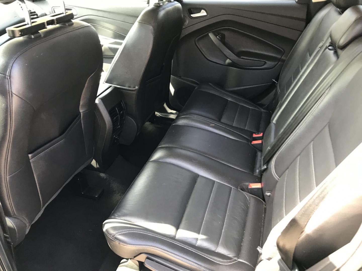 2016 Black /Black Ford Escape Titanium 4WD (1FMCU9JX2GU) with an 1.6L L4 DOHC 16V engine, 6-Speed Automatic transmission, located at 577 Chester Pike, Prospect Park, PA, 19076, (610) 237-1015, 39.886154, -75.302338 - 2016 Ford Escape Titanium: Only 109k miles, backup camera, sunroof, new PA inspection, SUPER CLEAN, runs LIKE NEW! This vehicle comes inspected and has been given a bumper to bumper safety check. It is very clean, reliable, and well maintained. We offer a unique pay plan that is known for being t- Photo#19