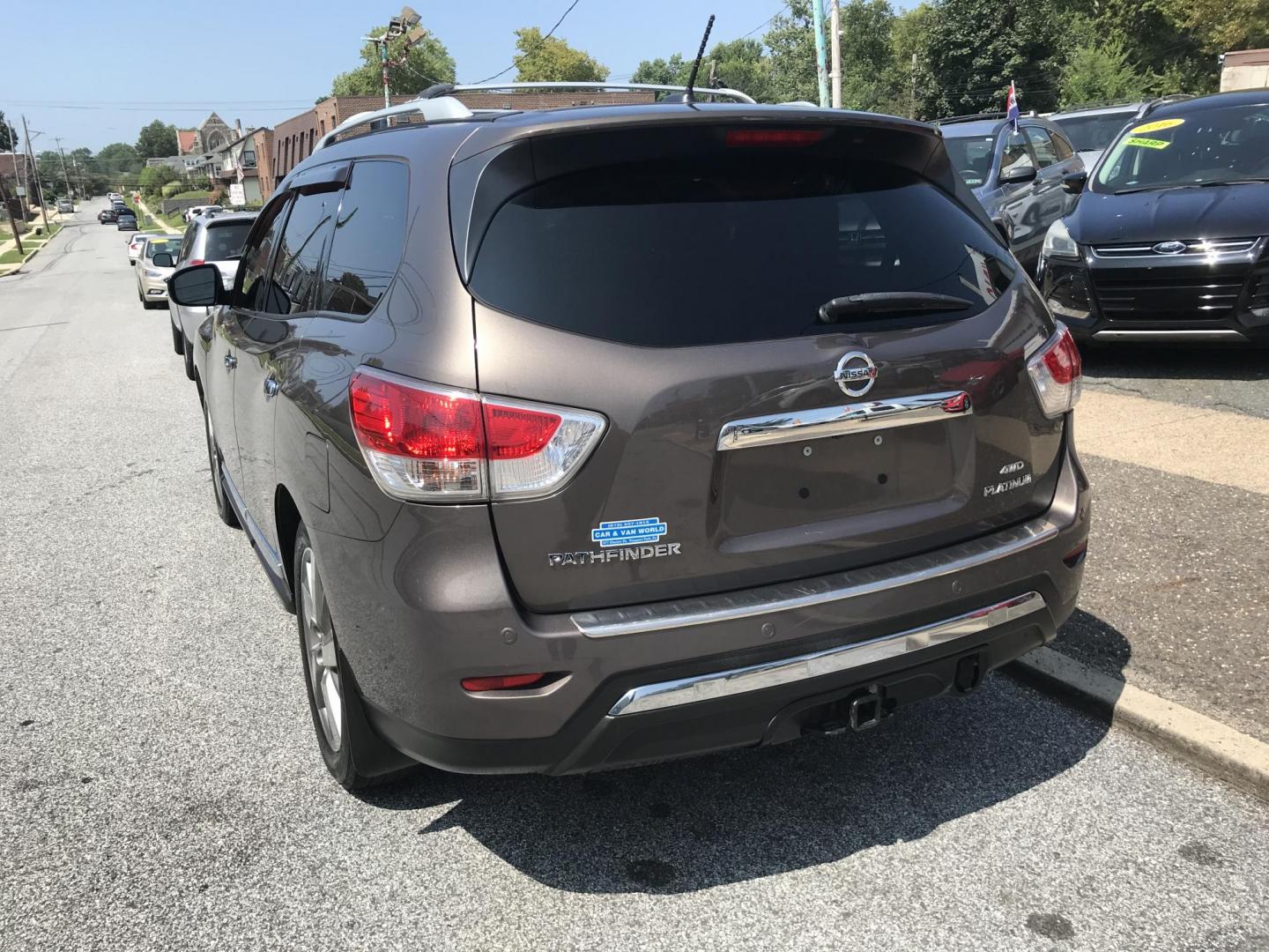 2015 Brown /Black Nissan Pathfinder Platinum 4WD (5N1AR2MM3FC) with an 3.5L V6 DOHC 24V engine, Continuously Variable Transmission transmission, located at 577 Chester Pike, Prospect Park, PA, 19076, (610) 237-1015, 39.886154, -75.302338 - Photo#5