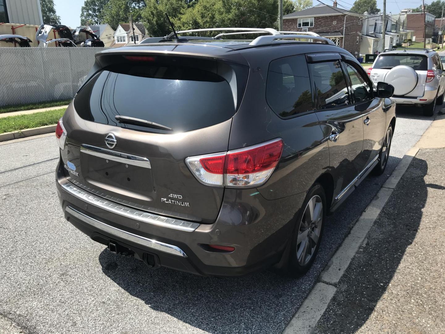 2015 Brown /Black Nissan Pathfinder Platinum 4WD (5N1AR2MM3FC) with an 3.5L V6 DOHC 24V engine, Continuously Variable Transmission transmission, located at 577 Chester Pike, Prospect Park, PA, 19076, (610) 237-1015, 39.886154, -75.302338 - Photo#4