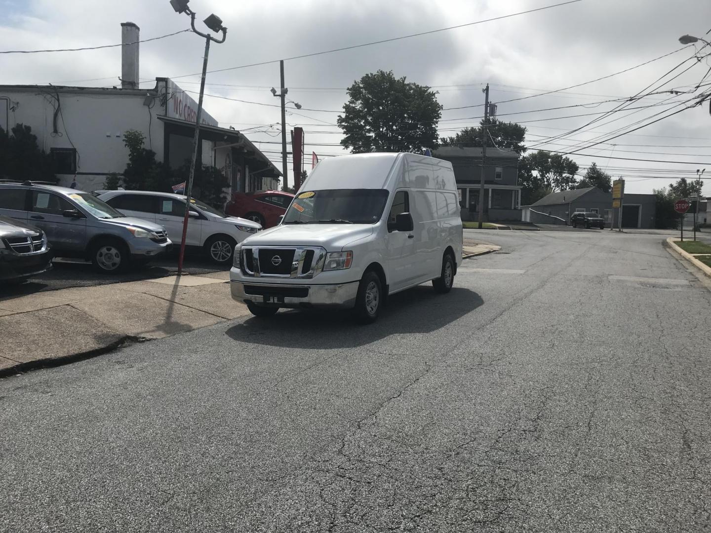 2013 White /Gray Nissan NV Cargo 3500 HD S V8 High Roof (1N6AF0LY1DN) with an 5.6L V8 DOHC 32V engine, 5-Speed Automatic transmission, located at 577 Chester Pike, Prospect Park, PA, 19076, (610) 237-1015, 39.886154, -75.302338 - 2013 Nissan NV 3500 High Roof: Has shelving, new PA inspection, V8, runs LIKE NEW! This vehicle comes inspected and has been given a bumper to bumper safety check. It is very clean, reliable, and well maintained. We offer a unique pay plan that is known for being the easiest and fastest financing - Photo#1