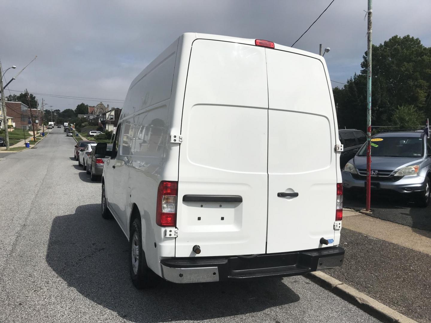 2013 White /Gray Nissan NV Cargo 3500 HD S V8 High Roof (1N6AF0LY1DN) with an 5.6L V8 DOHC 32V engine, 5-Speed Automatic transmission, located at 577 Chester Pike, Prospect Park, PA, 19076, (610) 237-1015, 39.886154, -75.302338 - 2013 Nissan NV 3500 High Roof: Has shelving, new PA inspection, V8, runs LIKE NEW! This vehicle comes inspected and has been given a bumper to bumper safety check. It is very clean, reliable, and well maintained. We offer a unique pay plan that is known for being the easiest and fastest financing - Photo#5