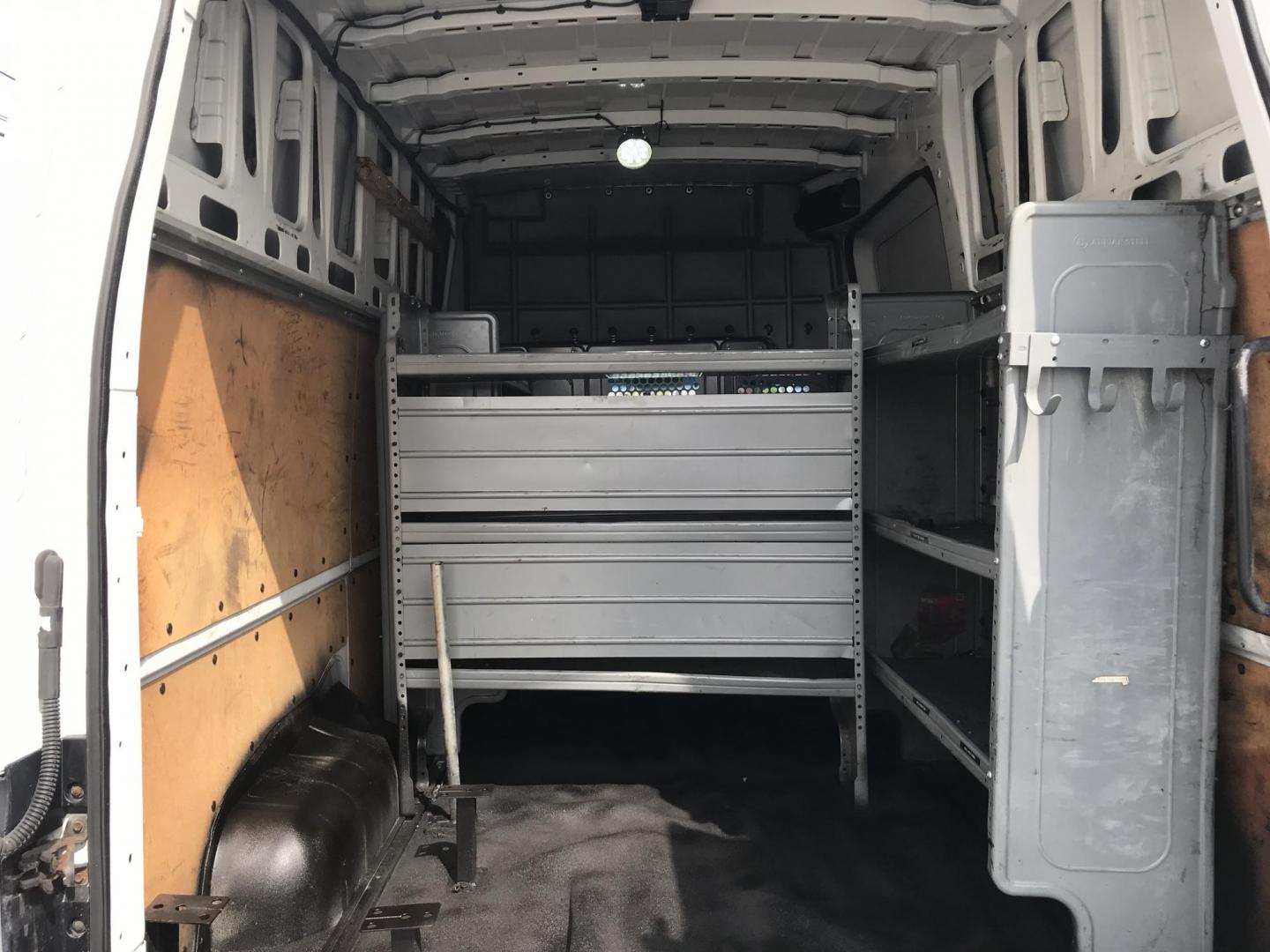 2013 White /Gray Nissan NV Cargo 3500 HD S V8 High Roof (1N6AF0LY1DN) with an 5.6L V8 DOHC 32V engine, 5-Speed Automatic transmission, located at 577 Chester Pike, Prospect Park, PA, 19076, (610) 237-1015, 39.886154, -75.302338 - 2013 Nissan NV 3500 High Roof: Has shelving, new PA inspection, V8, runs LIKE NEW! This vehicle comes inspected and has been given a bumper to bumper safety check. It is very clean, reliable, and well maintained. We offer a unique pay plan that is known for being the easiest and fastest financing - Photo#14