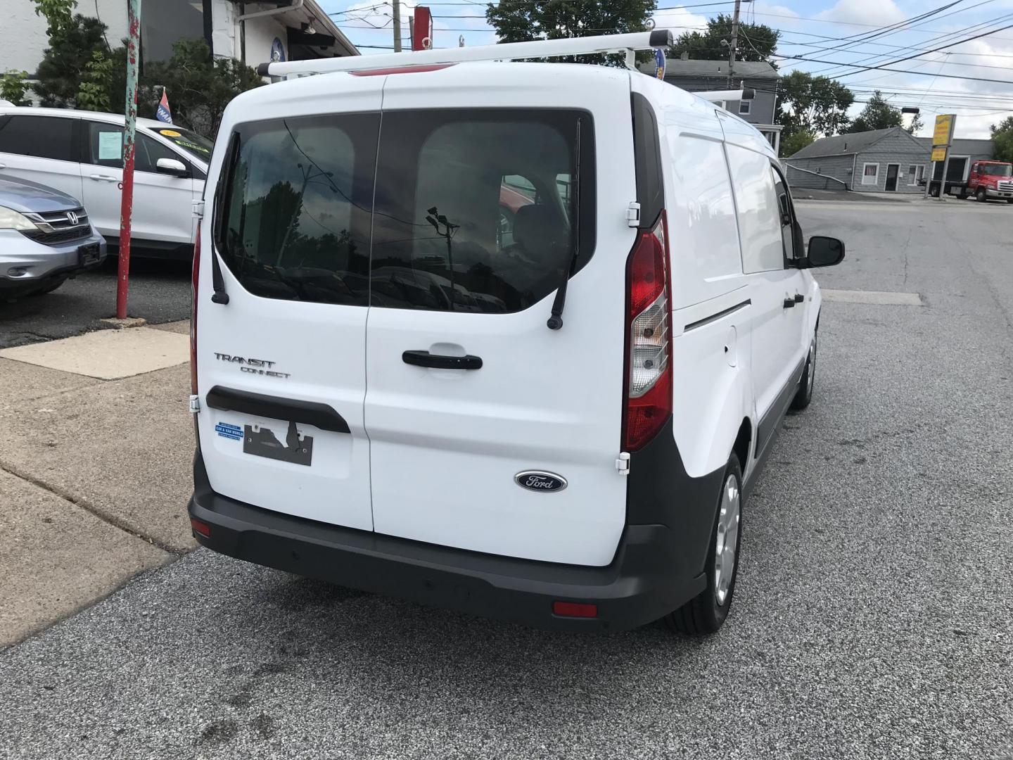 2016 White /Gray Ford Transit Connect Cargo Van XL LWB (NM0LS7E78G1) with an 2.5L L4 DOHC 16V engine, 6A transmission, located at 577 Chester Pike, Prospect Park, PA, 19076, (610) 237-1015, 39.886154, -75.302338 - Photo#6