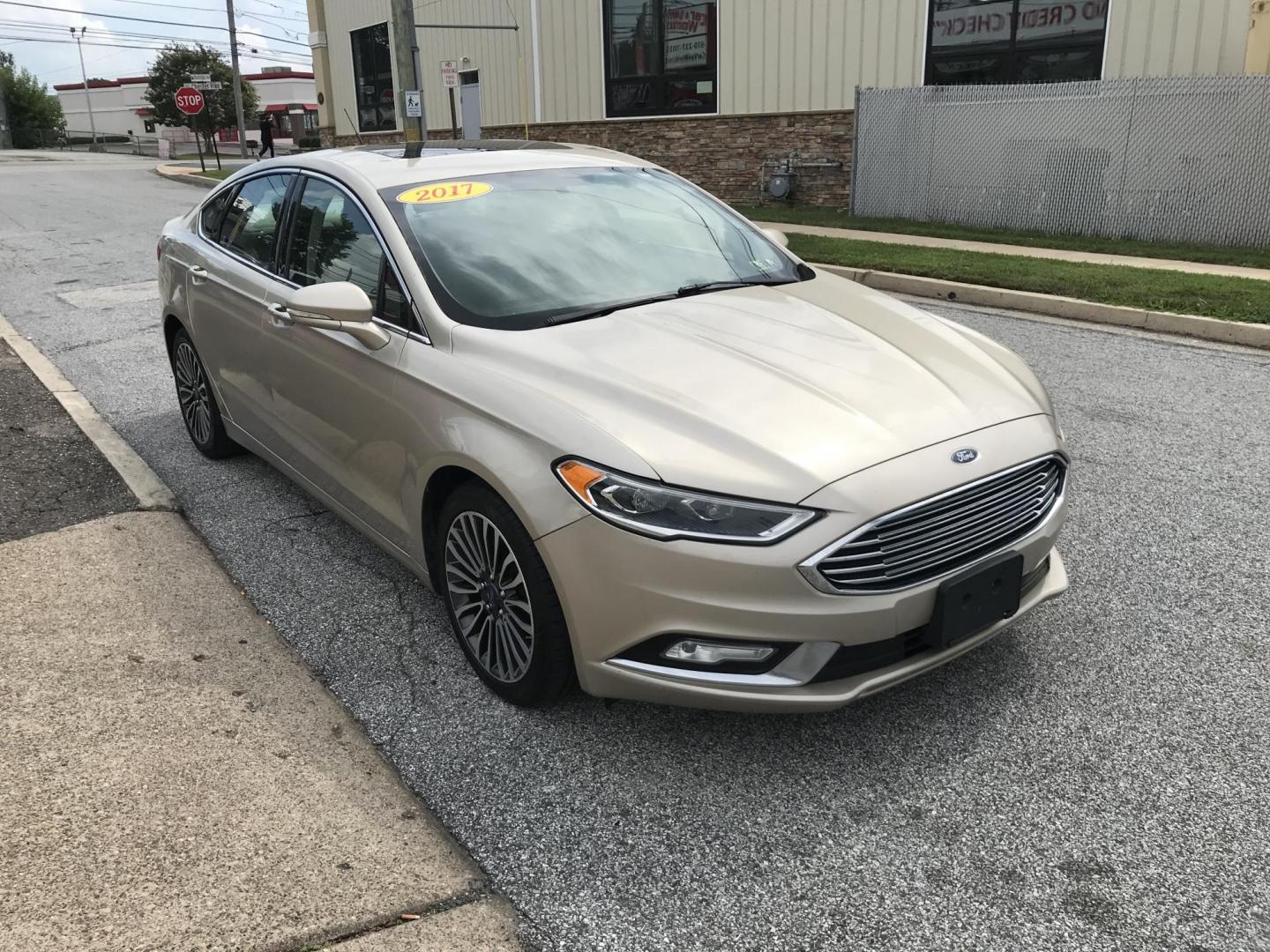 2017 Gold /Tan Ford Fusion SE (3FA6P0H94HR) with an 2.0L L4 DOHC 16V engine, 6A transmission, located at 577 Chester Pike, Prospect Park, PA, 19076, (610) 237-1015, 39.886154, -75.302338 - 2017 Ford Fusion SE: New PA inspection, great on gas, super clean, runs LIKE NEW! This vehicle comes inspected and has been given a bumper to bumper safety check. It is very clean, reliable, and well maintained. We offer a unique pay plan that is known for being the easiest and fastest financing - Photo#3