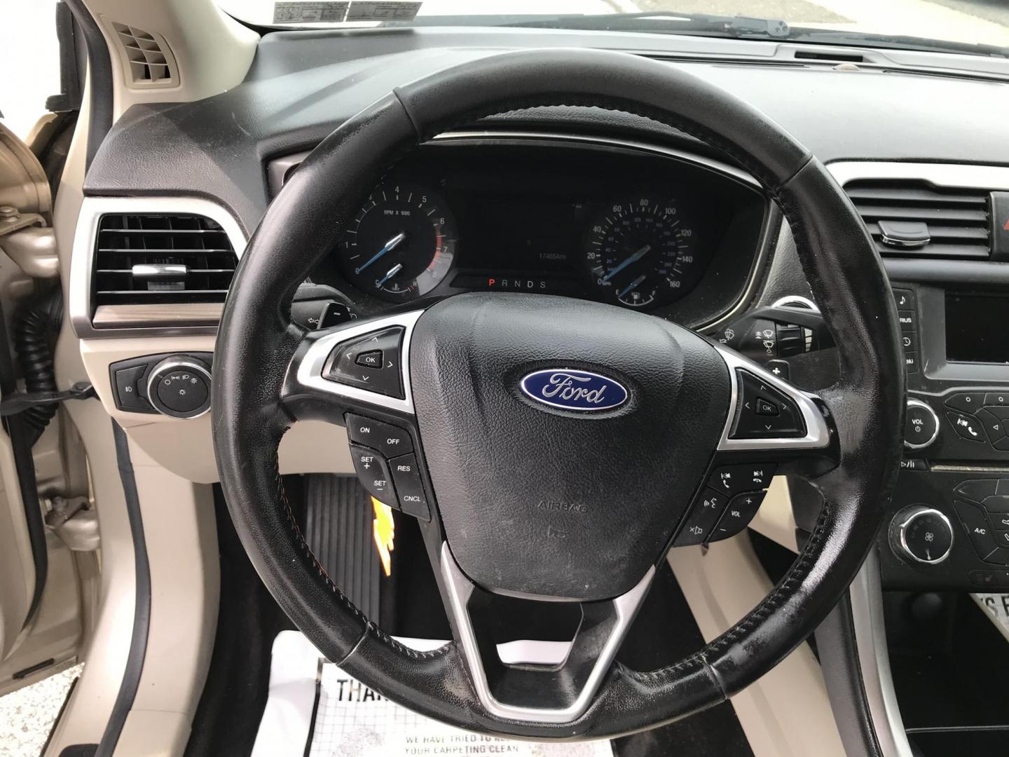 2017 Gold /Tan Ford Fusion SE (3FA6P0H94HR) with an 2.0L L4 DOHC 16V engine, 6A transmission, located at 577 Chester Pike, Prospect Park, PA, 19076, (610) 237-1015, 39.886154, -75.302338 - 2017 Ford Fusion SE: New PA inspection, great on gas, super clean, runs LIKE NEW! This vehicle comes inspected and has been given a bumper to bumper safety check. It is very clean, reliable, and well maintained. We offer a unique pay plan that is known for being the easiest and fastest financing - Photo#12