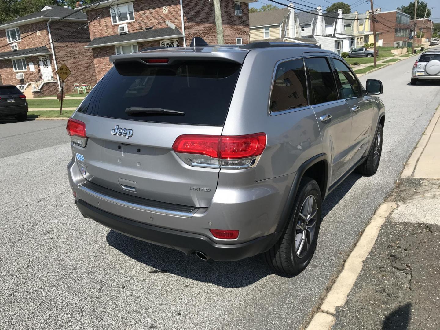 2018 Silver /Black Jeep Grand Cherokee Limited 4WD (1C4RJFBGXJC) with an 3.6L V6 DOHC 24V engine, 8A transmission, located at 577 Chester Pike, Prospect Park, PA, 19076, (610) 237-1015, 39.886154, -75.302338 - 2018 Jeep Grand Cherokee LIMITED: Navigation system, backup camera, sunroof, black leather interior, sunroof, 4x4, SUPER CLEAN, runs LIKE NEW! This vehicle comes inspected and has been given a bumper to bumper safety check. It is very clean, reliable, and well maintained. We offer a unique pay pl - Photo#4