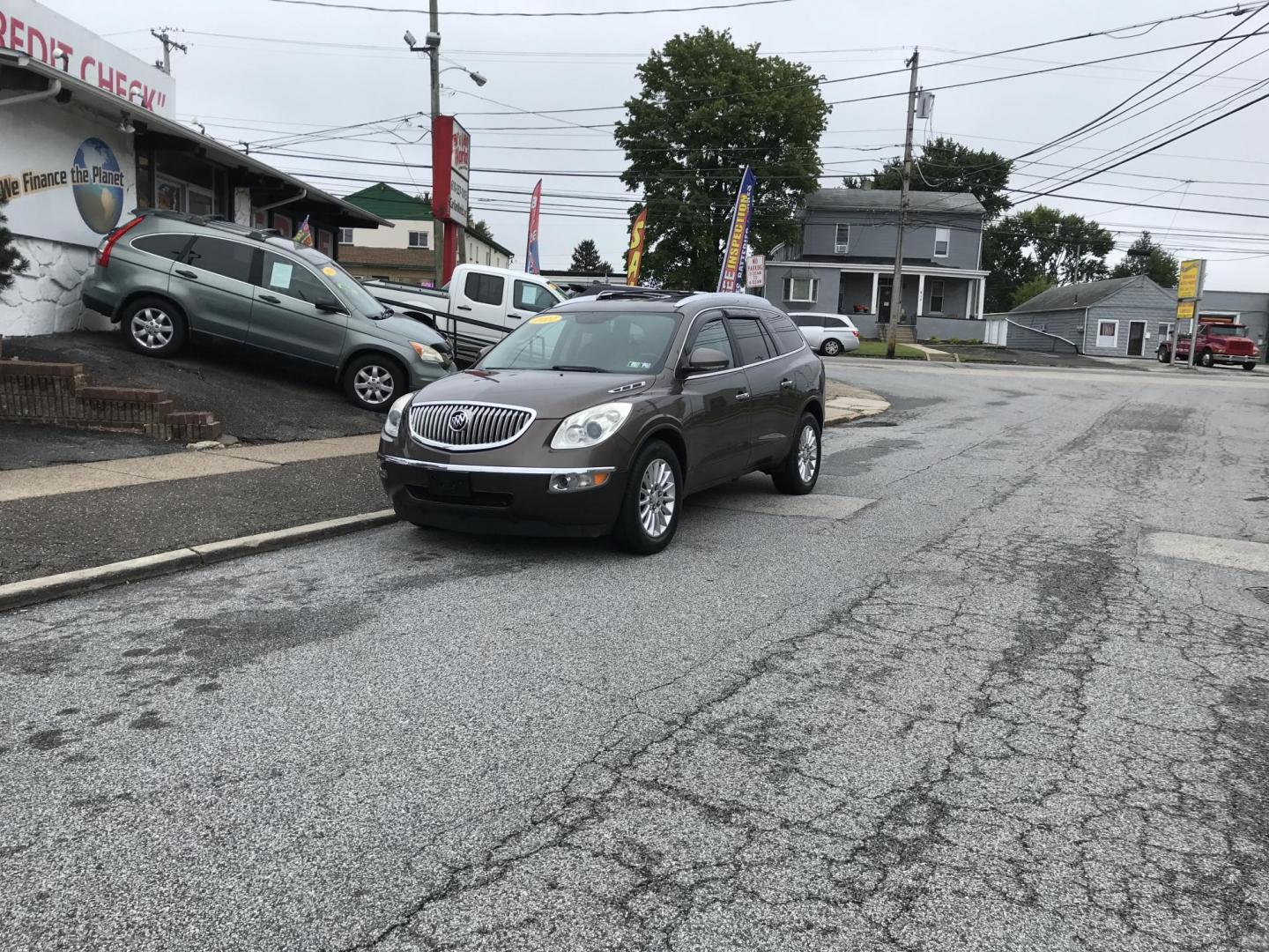 2011 Brown /Black Buick Enclave CXL-1 AWD (5GAKVBED1BJ) with an 3.6L V6 DOHC 24V engine, 6-Speed Automatic Overdrive transmission, located at 577 Chester Pike, Prospect Park, PA, 19076, (610) 237-1015, 39.886154, -75.302338 - 2011 Buick Enclave CXL: 3rd row seating, 4x4, backup camera, new PA inspection, SUPER CLEAN, runs LIKE NEW! This vehicle comes inspected and has been given a bumper to bumper safety check. It is very clean, reliable, and well maintained. We offer a unique pay plan that is known for being the easi - Photo#1