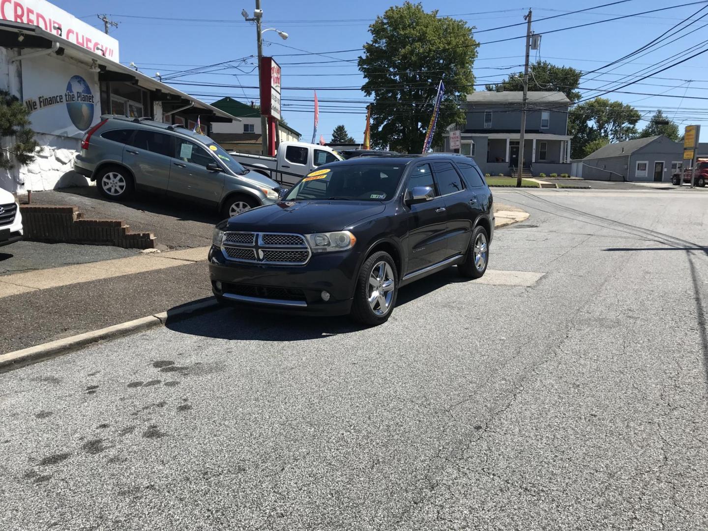 2012 Blue /Black Dodge Durango Citadel AWD (1C4SDJET9CC) with an 5.7L V8 OHV 16V engine, 5-Speed Automatic transmission, located at 577 Chester Pike, Prospect Park, PA, 19076, (610) 237-1015, 39.886154, -75.302338 - 2012 Dodge Durango Citadel: DVD player w/ headphones, navigation system, backup camera, 5.7 HEMI engine, remote start, 3rd row seating, AWD, new inspection, runs LIKE NEW! This vehicle comes inspected and has been given a bumper to bumper safety check. It is very clean, reliable, and well maintai - Photo#1