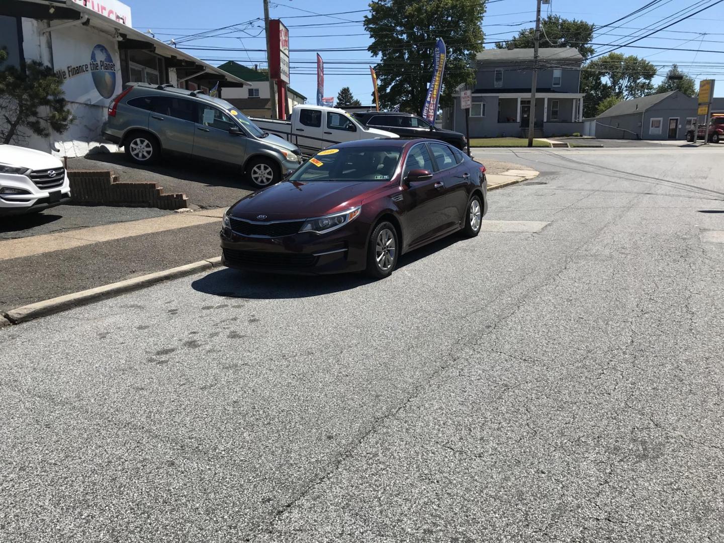 2016 Maroon /Beige Kia Optima LX (5XXGT4L34GG) with an 2.4L L4 DOHC 16V engine, 6A transmission, located at 577 Chester Pike, Prospect Park, PA, 19076, (610) 237-1015, 39.886154, -75.302338 - 2016 Kia Optima LX: Only 125k miles, backup camera, new PA inspection, SUPER CLEAN, runs LIKE NEW! This vehicle comes inspected and has been given a bumper to bumper safety check. It is very clean, reliable, and well maintained. We offer a unique pay plan that is known for being the easiest and f - Photo#1