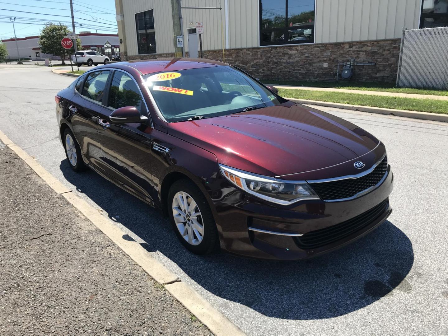 2016 Maroon /Beige Kia Optima LX (5XXGT4L34GG) with an 2.4L L4 DOHC 16V engine, 6A transmission, located at 577 Chester Pike, Prospect Park, PA, 19076, (610) 237-1015, 39.886154, -75.302338 - 2016 Kia Optima LX: Only 125k miles, backup camera, new PA inspection, SUPER CLEAN, runs LIKE NEW! This vehicle comes inspected and has been given a bumper to bumper safety check. It is very clean, reliable, and well maintained. We offer a unique pay plan that is known for being the easiest and f - Photo#3