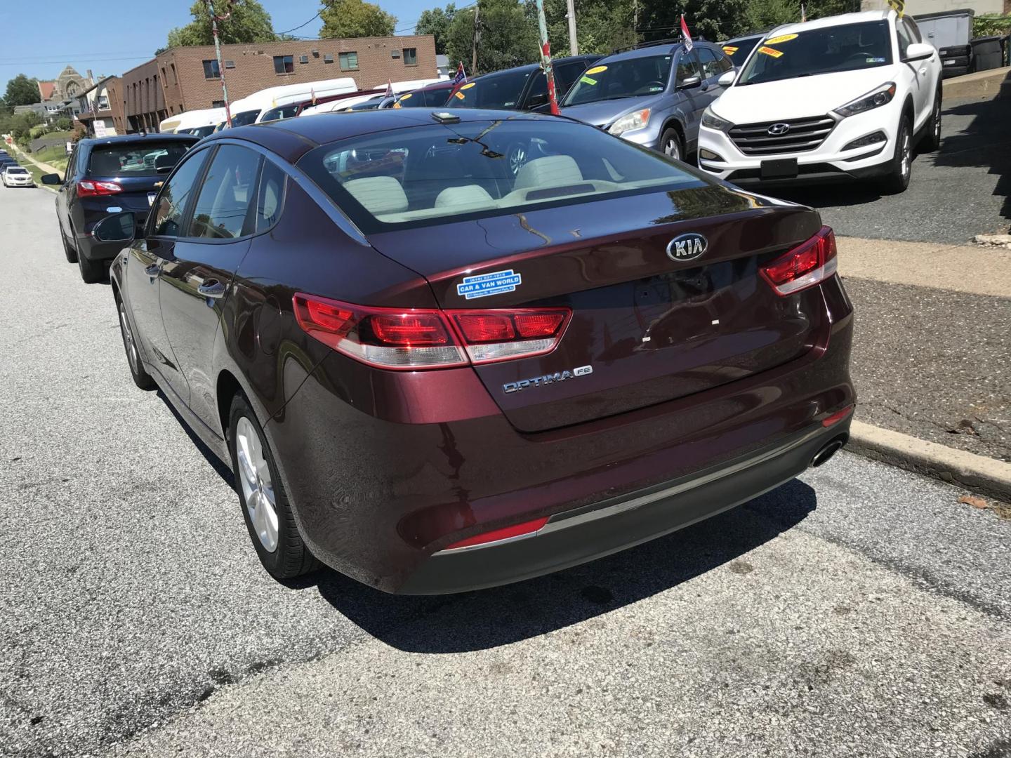 2016 Maroon /Beige Kia Optima LX (5XXGT4L34GG) with an 2.4L L4 DOHC 16V engine, 6A transmission, located at 577 Chester Pike, Prospect Park, PA, 19076, (610) 237-1015, 39.886154, -75.302338 - 2016 Kia Optima LX: Only 125k miles, backup camera, new PA inspection, SUPER CLEAN, runs LIKE NEW! This vehicle comes inspected and has been given a bumper to bumper safety check. It is very clean, reliable, and well maintained. We offer a unique pay plan that is known for being the easiest and f - Photo#5