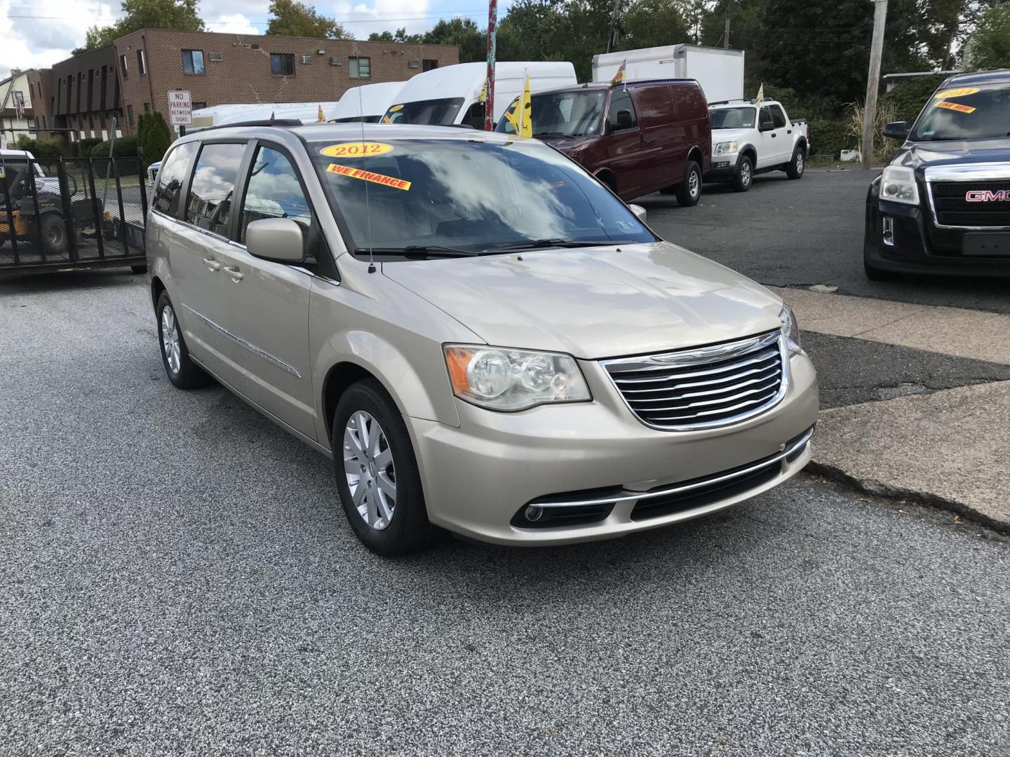 2012 Gold /Tan Chrysler Town & Country Touring (2C4RC1BG5CR) with an 3.6L V6 DOHC 24V engine, 6-Speed Automatic transmission, located at 577 Chester Pike, Prospect Park, PA, 19076, (610) 237-1015, 39.886154, -75.302338 - 2012 Chrysler Town & Country Touring: Navigation system, backup camera, stow and go seating, DVD player, new PA inspection, runs LIKE NEW! This vehicle comes inspected and has been given a bumper to bumper safety check. It is very clean, reliable, and well maintained. We offer a unique pay plan t - Photo#2