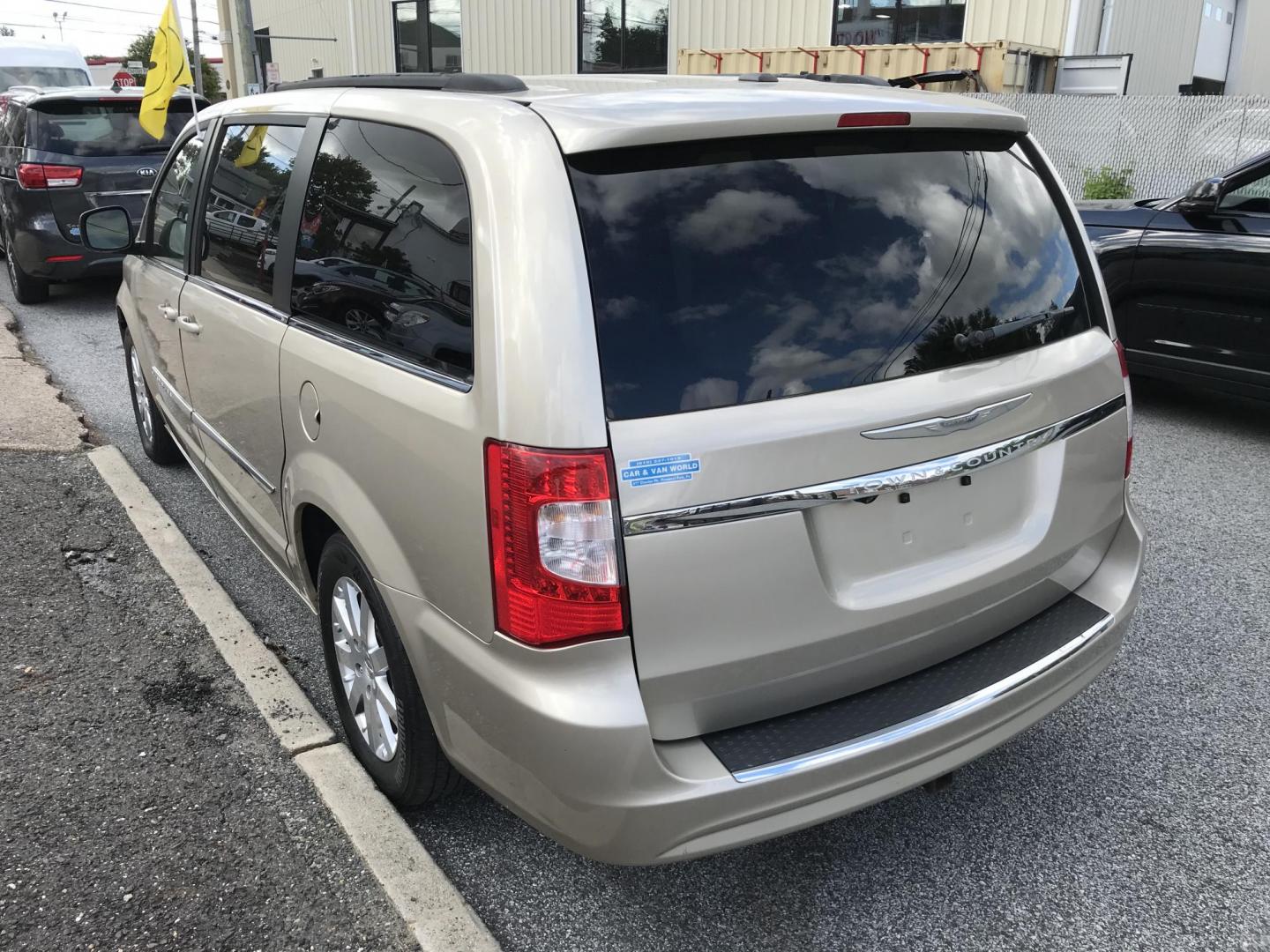 2012 Gold /Tan Chrysler Town & Country Touring (2C4RC1BG5CR) with an 3.6L V6 DOHC 24V engine, 6-Speed Automatic transmission, located at 577 Chester Pike, Prospect Park, PA, 19076, (610) 237-1015, 39.886154, -75.302338 - 2012 Chrysler Town & Country Touring: Navigation system, backup camera, stow and go seating, DVD player, new PA inspection, runs LIKE NEW! This vehicle comes inspected and has been given a bumper to bumper safety check. It is very clean, reliable, and well maintained. We offer a unique pay plan t - Photo#4