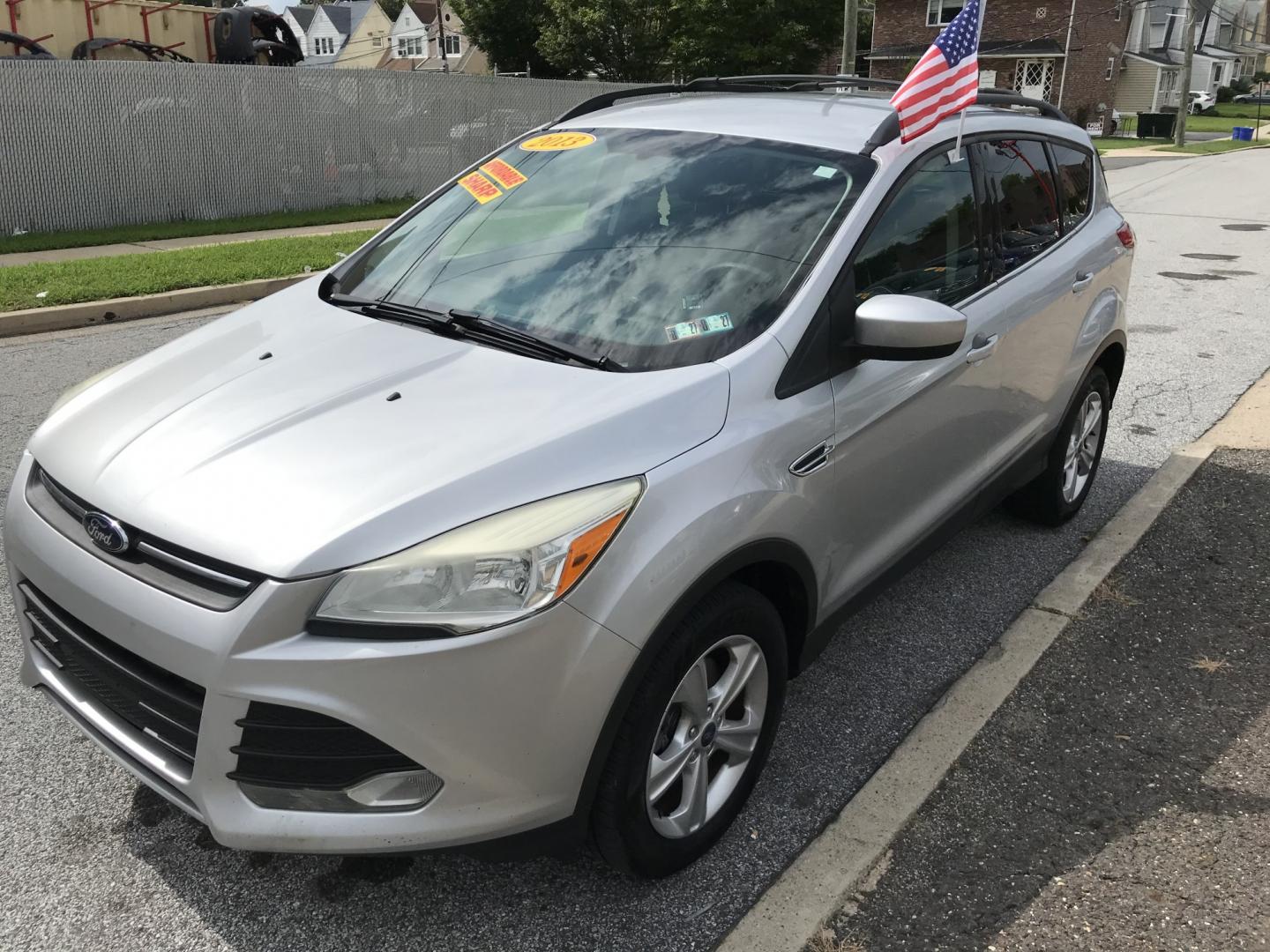 2013 Silver /Gray Ford Escape SE 4WD (1FMCU9G9XDU) with an 2.0L L4 DOHC 16V engine, 6-Speed Automatic transmission, located at 577 Chester Pike, Prospect Park, PA, 19076, (610) 237-1015, 39.886154, -75.302338 - 2013 Ford Escape SE: 4x4, new PA inspection, great on gas, SUPER CLEAN, runs LIKE NEW! This vehicle comes inspected and has been given a bumper to bumper safety check. It is very clean, reliable, and well maintained. We offer a unique pay plan that is known for being the easiest and fastest finan- Photo#3