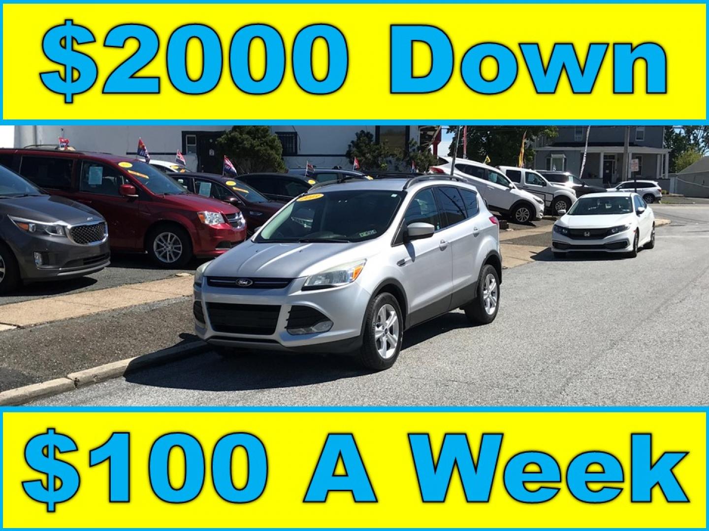 2013 Silver /Gray Ford Escape SE FWD (1FMCU0GX1DU) with an 1.6L L4 DOHC 16V engine, 6-Speed Automatic transmission, located at 577 Chester Pike, Prospect Park, PA, 19076, (610) 237-1015, 39.886154, -75.302338 - Photo#0