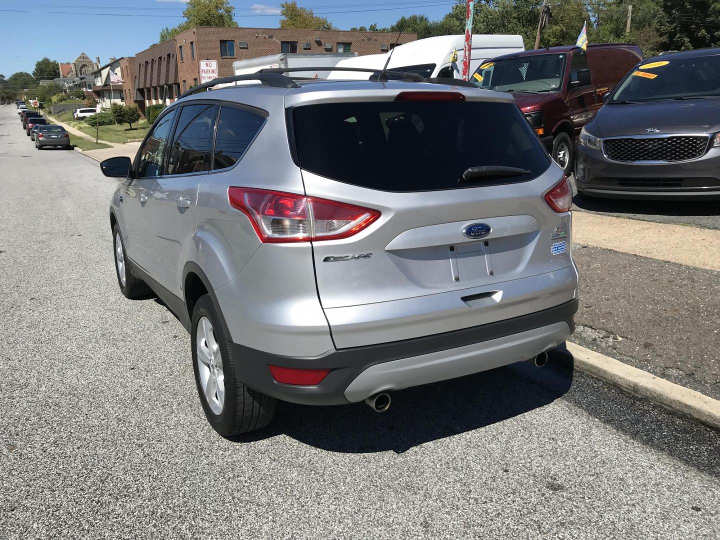 2013 Silver /Gray Ford Escape SE FWD (1FMCU0GX1DU) with an 1.6L L4 DOHC 16V engine, 6-Speed Automatic transmission, located at 577 Chester Pike, Prospect Park, PA, 19076, (610) 237-1015, 39.886154, -75.302338 - Photo#5