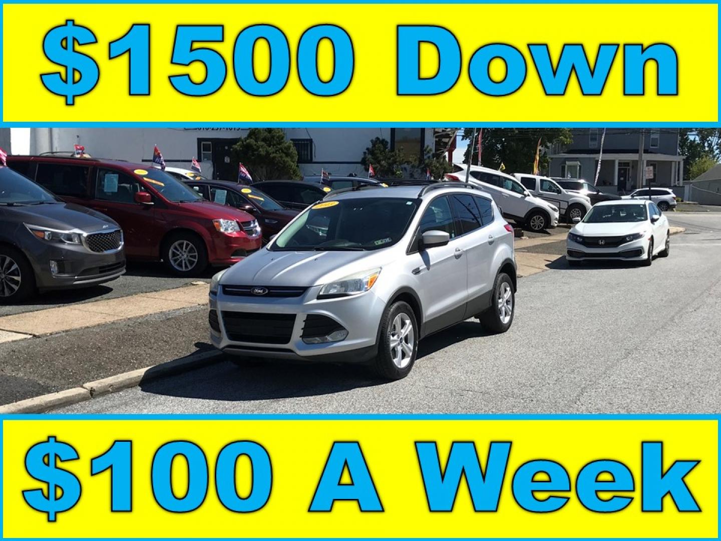 2013 Silver /Gray Ford Escape SE FWD (1FMCU0GX1DU) with an 1.6L L4 DOHC 16V engine, 6-Speed Automatic transmission, located at 577 Chester Pike, Prospect Park, PA, 19076, (610) 237-1015, 39.886154, -75.302338 - Photo#0