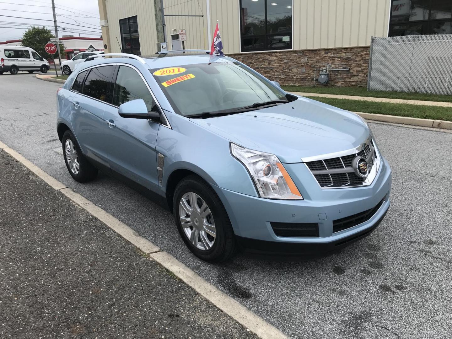 2011 Blue /Beige Cadillac SRX Luxury Collection AWD (3GYFNDEY2BS) with an 3.0L V6 DOHC 24V engine, 6-Speed Automatic transmission, located at 577 Chester Pike, Prospect Park, PA, 19076, (610) 237-1015, 39.886154, -75.302338 - Photo#3