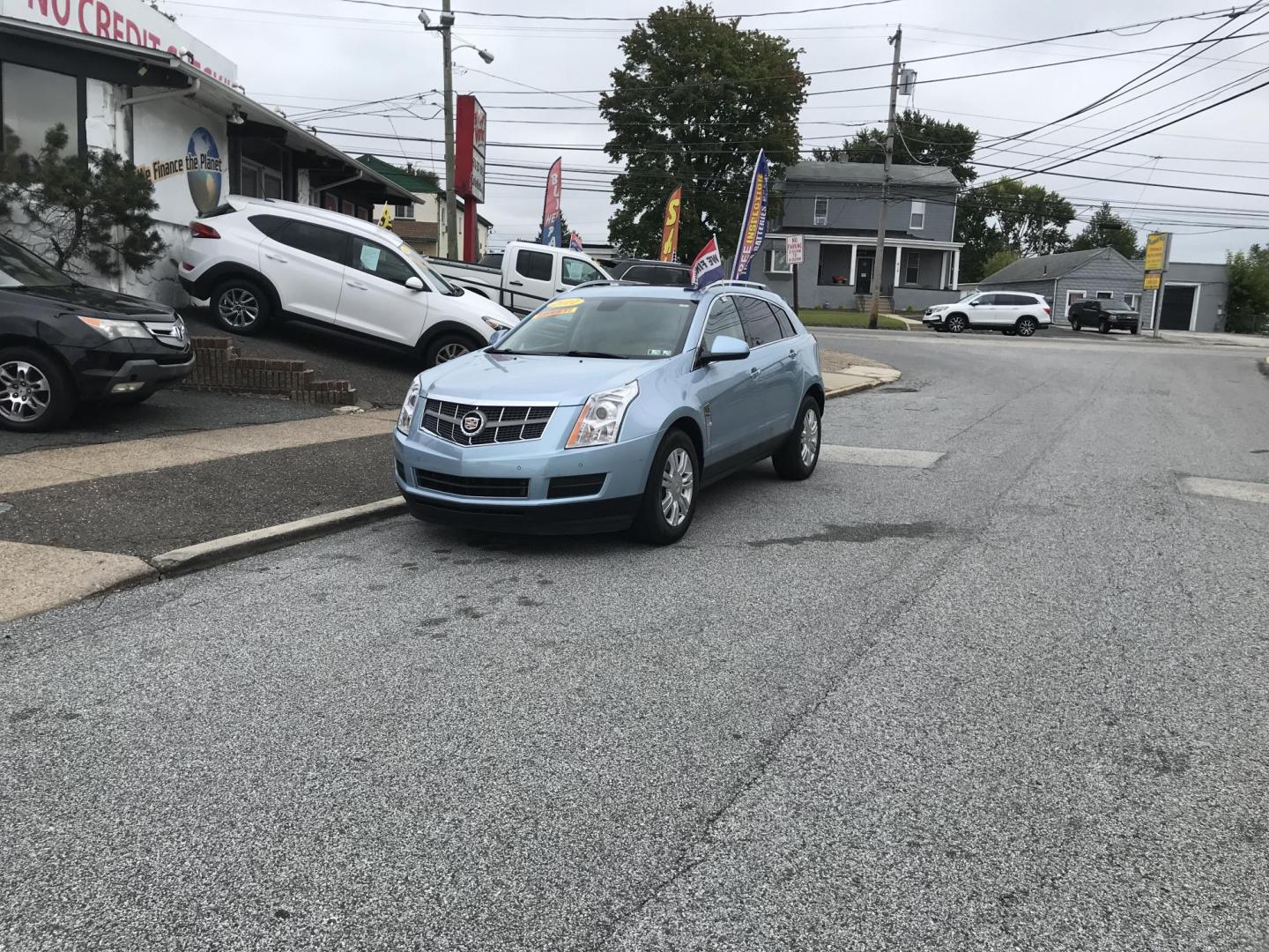 2011 Blue /Beige Cadillac SRX Luxury Collection AWD (3GYFNDEY2BS) with an 3.0L V6 DOHC 24V engine, 6-Speed Automatic transmission, located at 577 Chester Pike, Prospect Park, PA, 19076, (610) 237-1015, 39.886154, -75.302338 - Photo#1