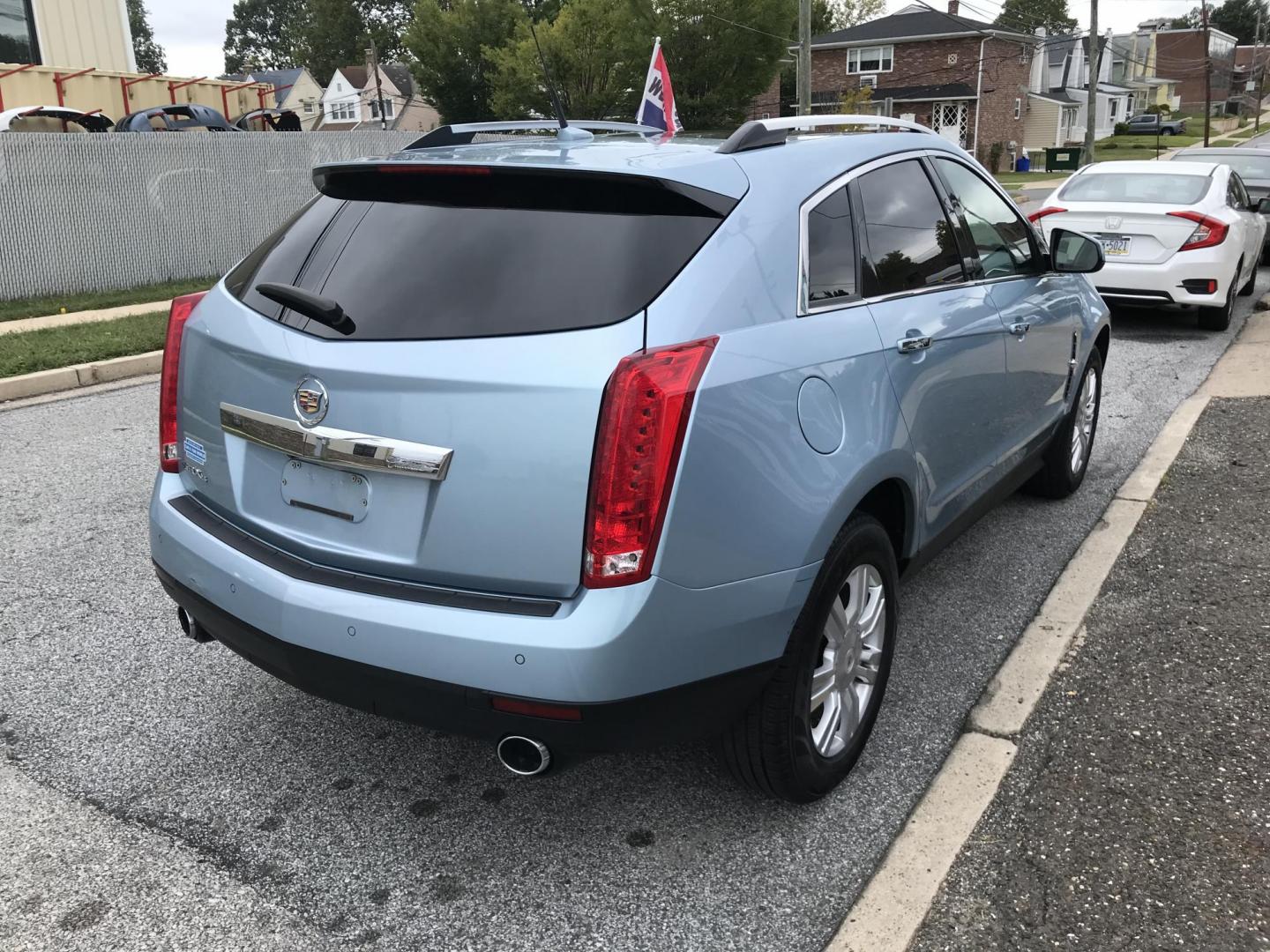 2011 Blue /Beige Cadillac SRX Luxury Collection AWD (3GYFNDEY2BS) with an 3.0L V6 DOHC 24V engine, 6-Speed Automatic transmission, located at 577 Chester Pike, Prospect Park, PA, 19076, (610) 237-1015, 39.886154, -75.302338 - Photo#4