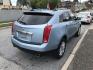 2011 Blue /Beige Cadillac SRX Luxury Collection AWD (3GYFNDEY2BS) with an 3.0L V6 DOHC 24V engine, 6-Speed Automatic transmission, located at 577 Chester Pike, Prospect Park, PA, 19076, (610) 237-1015, 39.886154, -75.302338 - Photo#4