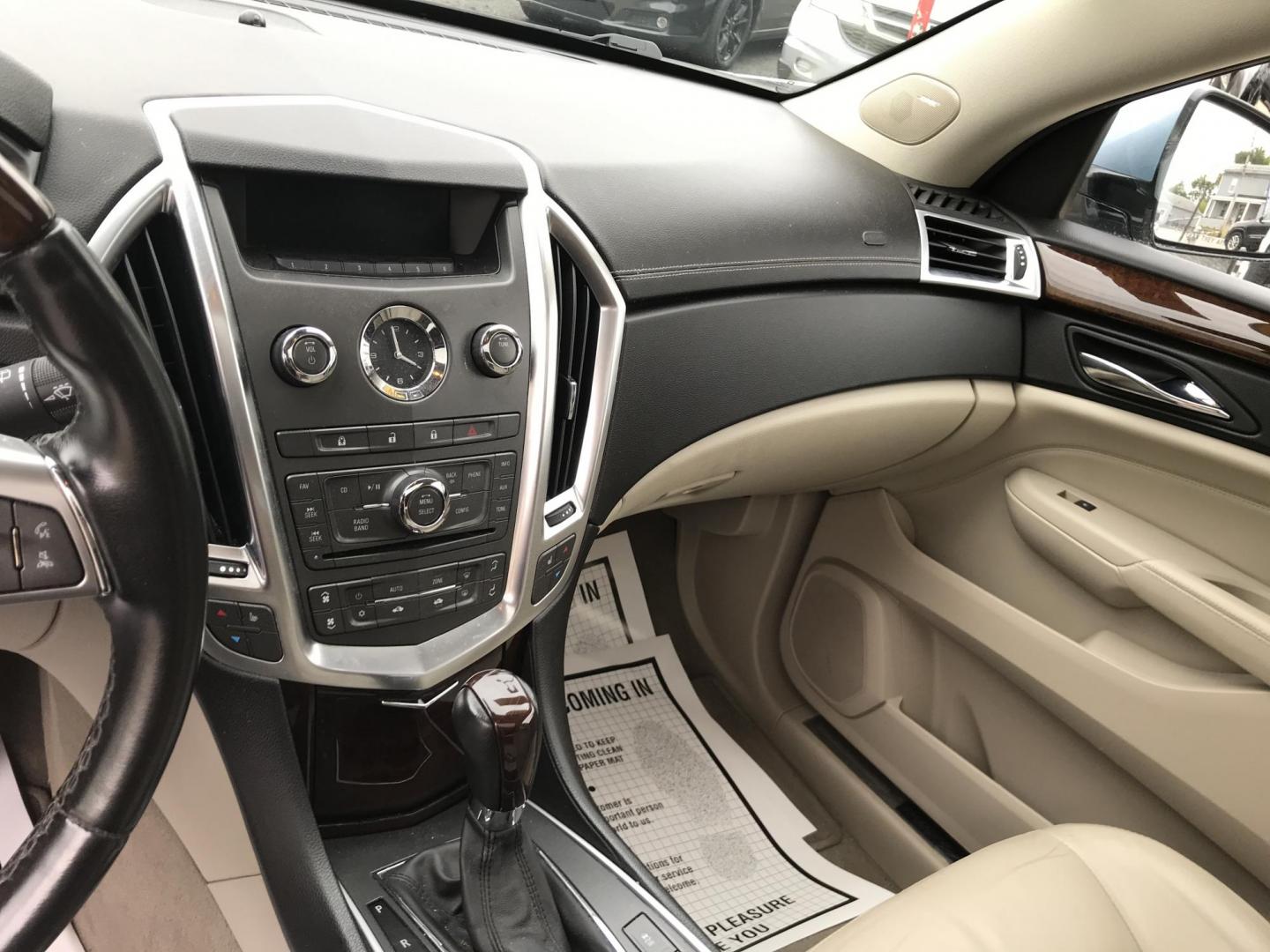 2011 Blue /Beige Cadillac SRX Luxury Collection AWD (3GYFNDEY2BS) with an 3.0L V6 DOHC 24V engine, 6-Speed Automatic transmission, located at 577 Chester Pike, Prospect Park, PA, 19076, (610) 237-1015, 39.886154, -75.302338 - Photo#12
