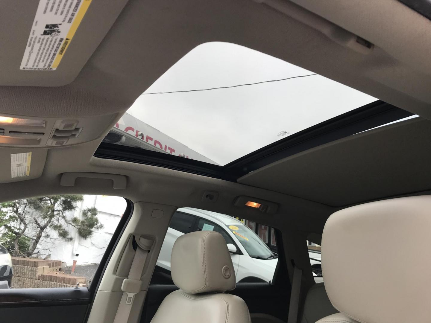 2011 Blue /Beige Cadillac SRX Luxury Collection AWD (3GYFNDEY2BS) with an 3.0L V6 DOHC 24V engine, 6-Speed Automatic transmission, located at 577 Chester Pike, Prospect Park, PA, 19076, (610) 237-1015, 39.886154, -75.302338 - Photo#16