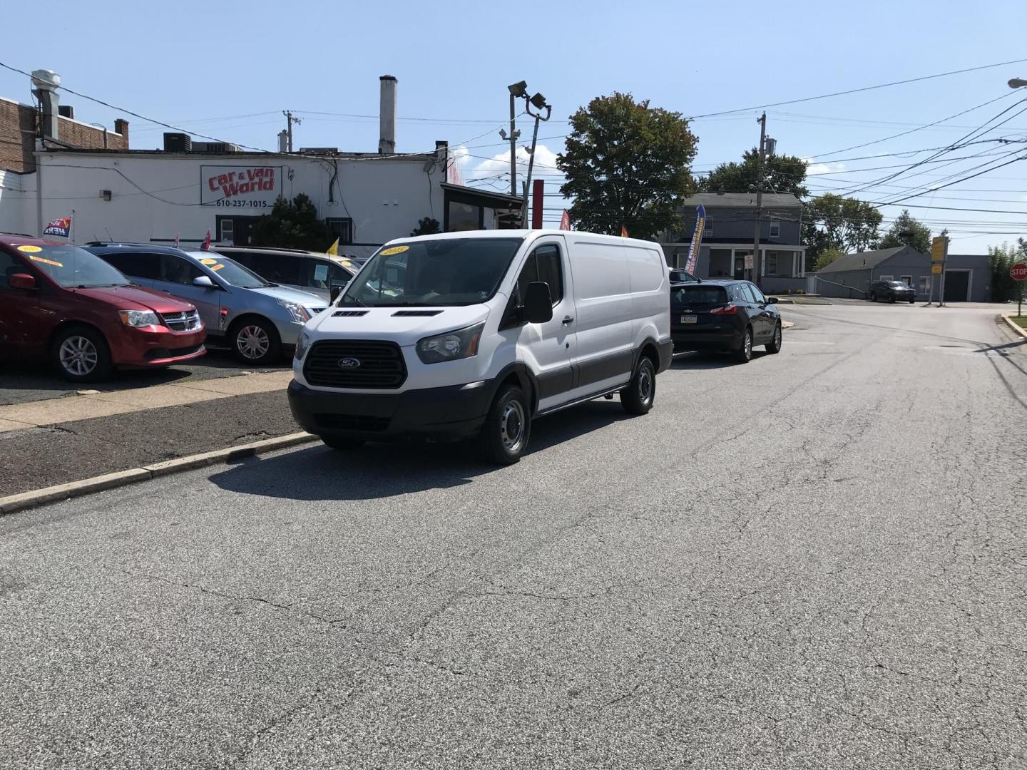 2015 White /Gray Ford Transit 250 Van Low Roof 60/40 Pass.130-in. WB (1FTNR1ZM0FK) with an 3.7L V6 DOHC 24V engine, 6-Speed Automatic transmission, located at 577 Chester Pike, Prospect Park, PA, 19076, (610) 237-1015, 39.886154, -75.302338 - 2015 Ford Transit 250: Only 100k miles, multiple pieces of shelving, partition, no side or rear windows, FLEET MAINTAINED! This vehicle comes inspected and has been given a bumper to bumper safety check. It is very clean, reliable, and well maintained. We offer a unique pay plan that is known for - Photo#1