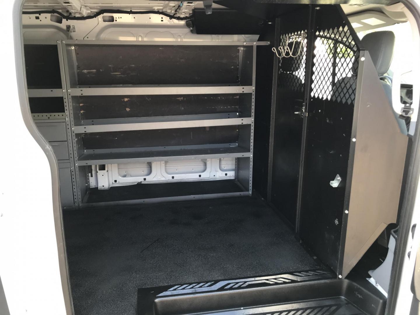 2015 White /Gray Ford Transit 250 Van Low Roof 60/40 Pass.130-in. WB (1FTNR1ZM0FK) with an 3.7L V6 DOHC 24V engine, 6-Speed Automatic transmission, located at 577 Chester Pike, Prospect Park, PA, 19076, (610) 237-1015, 39.886154, -75.302338 - 2015 Ford Transit 250: Only 100k miles, multiple pieces of shelving, partition, no side or rear windows, FLEET MAINTAINED! This vehicle comes inspected and has been given a bumper to bumper safety check. It is very clean, reliable, and well maintained. We offer a unique pay plan that is known for - Photo#19