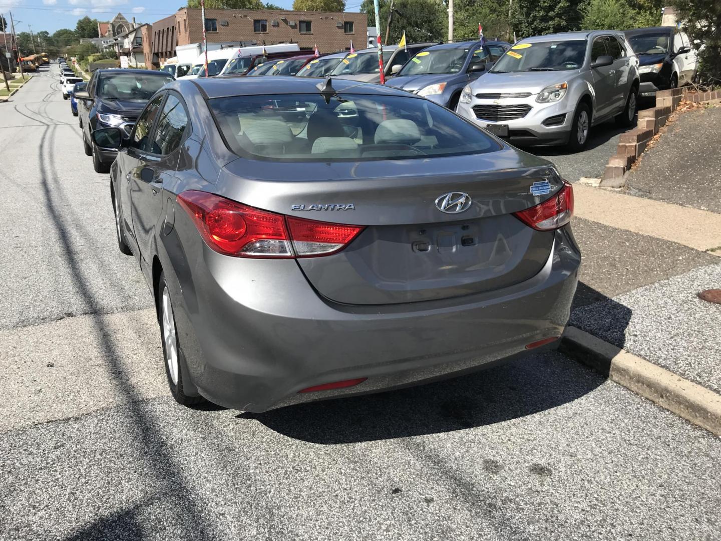 2013 Gray /Gray Hyundai Elantra GLS (5NPDH4AE3DH) with an 1.8L L4 DOHC 16V engine, 6-Speed Automatic transmission, located at 577 Chester Pike, Prospect Park, PA, 19076, (610) 237-1015, 39.886154, -75.302338 - 2013 Hyundai Elantra GLS: Great on gas, new PA inspection, SUPER CLEAN, runs LIKE NEW! This vehicle comes inspected and has been given a bumper to bumper safety check. It is very clean, reliable, and well maintained. We offer a unique pay plan that is known for being the easiest and fastest finan - Photo#5