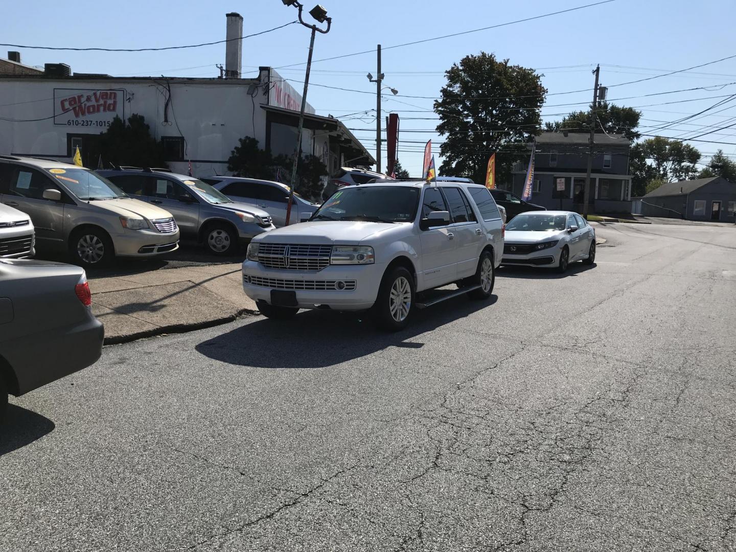 2011 White /Black Lincoln Navigator Limited Edition (5LMJJ2J54BE) with an 5.4L V8 SOHC 24V engine, 6-Speed Automatic transmission, located at 577 Chester Pike, Prospect Park, PA, 19076, (610) 237-1015, 39.886154, -75.302338 - 2011 Lincoln Navigator Limited Edition: Only 132k miles, DVD player, navigation system, backup camera, sunroof, 4WD, 3rd row, FULLY LOADED! This vehicle comes inspected and has been given a bumper to bumper safety check. It is very clean, reliable, and well maintained. We offer a unique pay plan - Photo#1