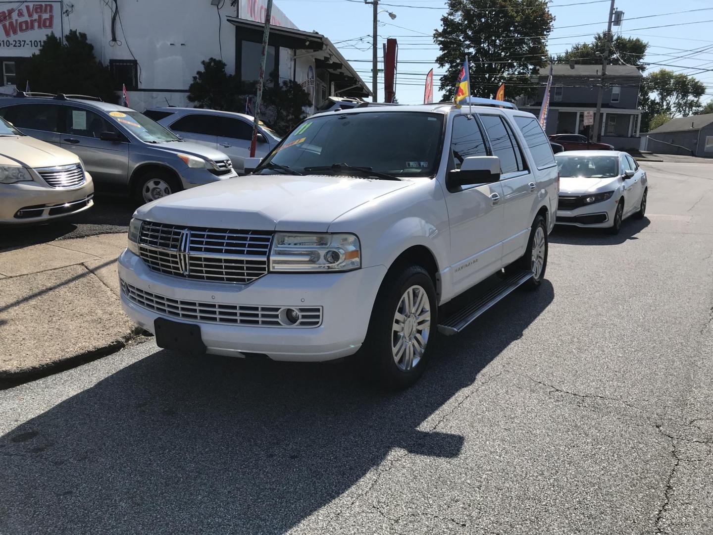 2011 White /Black Lincoln Navigator Limited Edition (5LMJJ2J54BE) with an 5.4L V8 SOHC 24V engine, 6-Speed Automatic transmission, located at 577 Chester Pike, Prospect Park, PA, 19076, (610) 237-1015, 39.886154, -75.302338 - 2011 Lincoln Navigator Limited Edition: Only 132k miles, DVD player, navigation system, backup camera, sunroof, 4WD, 3rd row, FULLY LOADED! This vehicle comes inspected and has been given a bumper to bumper safety check. It is very clean, reliable, and well maintained. We offer a unique pay plan - Photo#2
