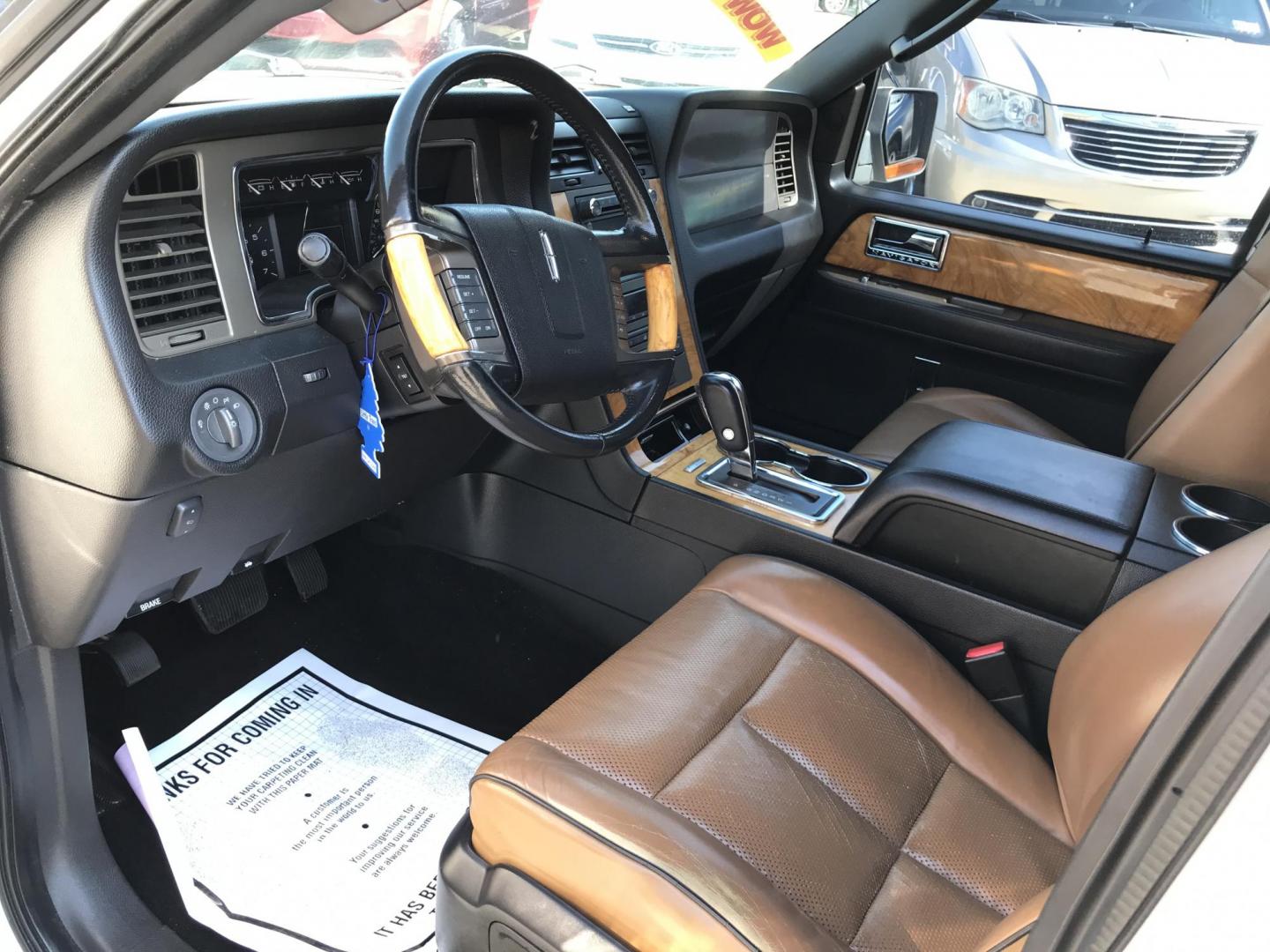 2011 White /Black Lincoln Navigator Limited Edition (5LMJJ2J54BE) with an 5.4L V8 SOHC 24V engine, 6-Speed Automatic transmission, located at 577 Chester Pike, Prospect Park, PA, 19076, (610) 237-1015, 39.886154, -75.302338 - 2011 Lincoln Navigator Limited Edition: Only 132k miles, DVD player, navigation system, backup camera, sunroof, 4WD, 3rd row, FULLY LOADED! This vehicle comes inspected and has been given a bumper to bumper safety check. It is very clean, reliable, and well maintained. We offer a unique pay plan - Photo#9