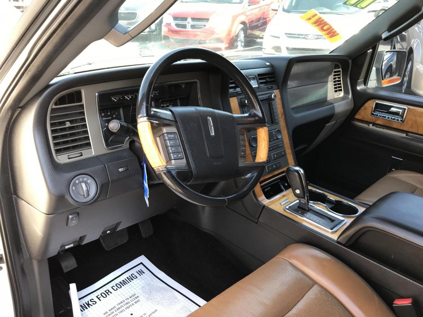 2011 White /Black Lincoln Navigator Limited Edition (5LMJJ2J54BE) with an 5.4L V8 SOHC 24V engine, 6-Speed Automatic transmission, located at 577 Chester Pike, Prospect Park, PA, 19076, (610) 237-1015, 39.886154, -75.302338 - 2011 Lincoln Navigator Limited Edition: Only 132k miles, DVD player, navigation system, backup camera, sunroof, 4WD, 3rd row, FULLY LOADED! This vehicle comes inspected and has been given a bumper to bumper safety check. It is very clean, reliable, and well maintained. We offer a unique pay plan - Photo#12