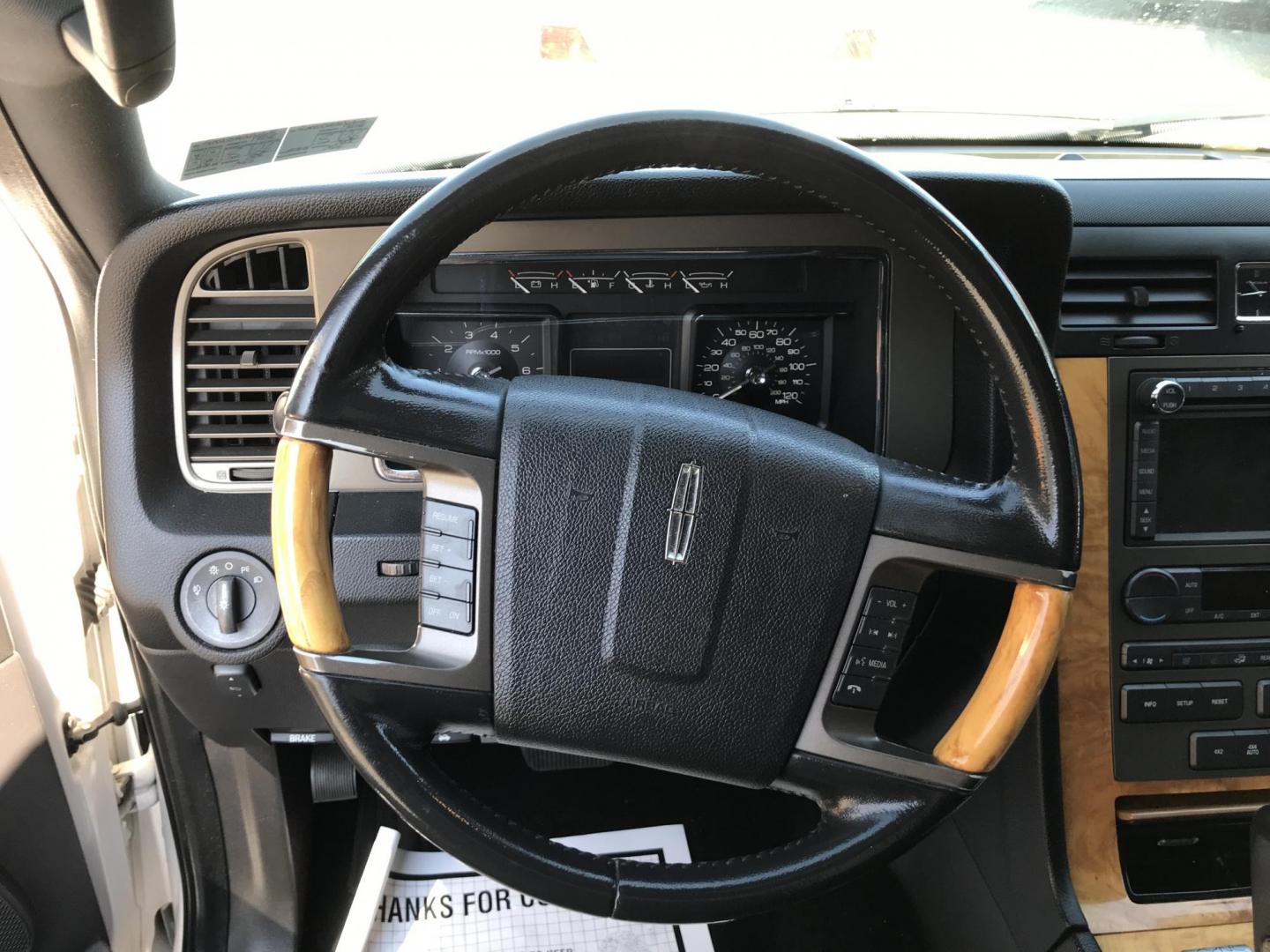 2011 White /Black Lincoln Navigator Limited Edition (5LMJJ2J54BE) with an 5.4L V8 SOHC 24V engine, 6-Speed Automatic transmission, located at 577 Chester Pike, Prospect Park, PA, 19076, (610) 237-1015, 39.886154, -75.302338 - 2011 Lincoln Navigator Limited Edition: Only 132k miles, DVD player, navigation system, backup camera, sunroof, 4WD, 3rd row, FULLY LOADED! This vehicle comes inspected and has been given a bumper to bumper safety check. It is very clean, reliable, and well maintained. We offer a unique pay plan - Photo#13