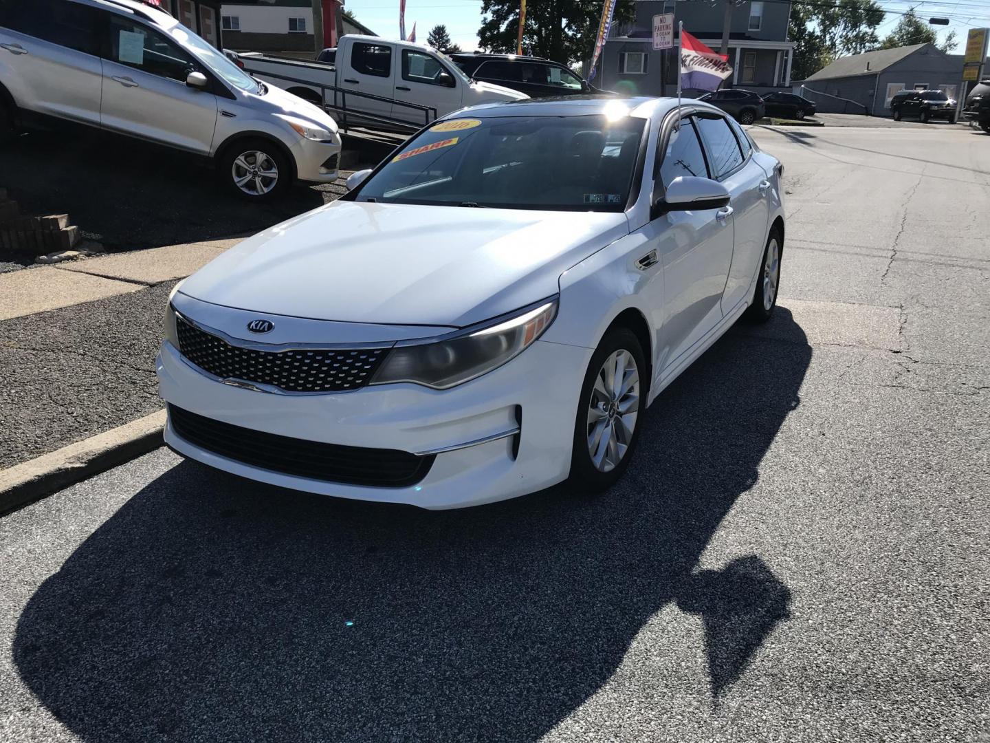 2016 White /Tan Kia Optima EX (5XXGU4L30GG) with an 2.4L L4 DOHC 16V engine, 6A transmission, located at 577 Chester Pike, Prospect Park, PA, 19076, (610) 237-1015, 39.886154, -75.302338 - 2016 Kia Optima EX: Only 89k miles, sunroof, navigation system, backup camera, new PA inspection, FULLY LOADED, runs LIKE NEW! This vehicle comes inspected and has been given a bumper to bumper safety check. It is very clean, reliable, and well maintained. We offer a unique pay plan that is known - Photo#2