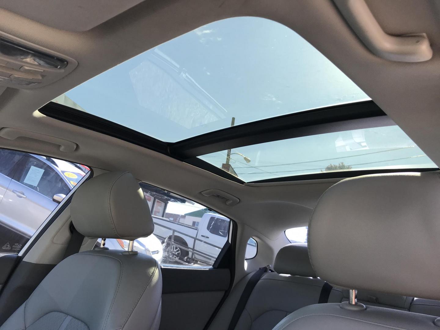 2016 White /Tan Kia Optima EX (5XXGU4L30GG) with an 2.4L L4 DOHC 16V engine, 6A transmission, located at 577 Chester Pike, Prospect Park, PA, 19076, (610) 237-1015, 39.886154, -75.302338 - 2016 Kia Optima EX: Only 89k miles, sunroof, navigation system, backup camera, new PA inspection, FULLY LOADED, runs LIKE NEW! This vehicle comes inspected and has been given a bumper to bumper safety check. It is very clean, reliable, and well maintained. We offer a unique pay plan that is known - Photo#19