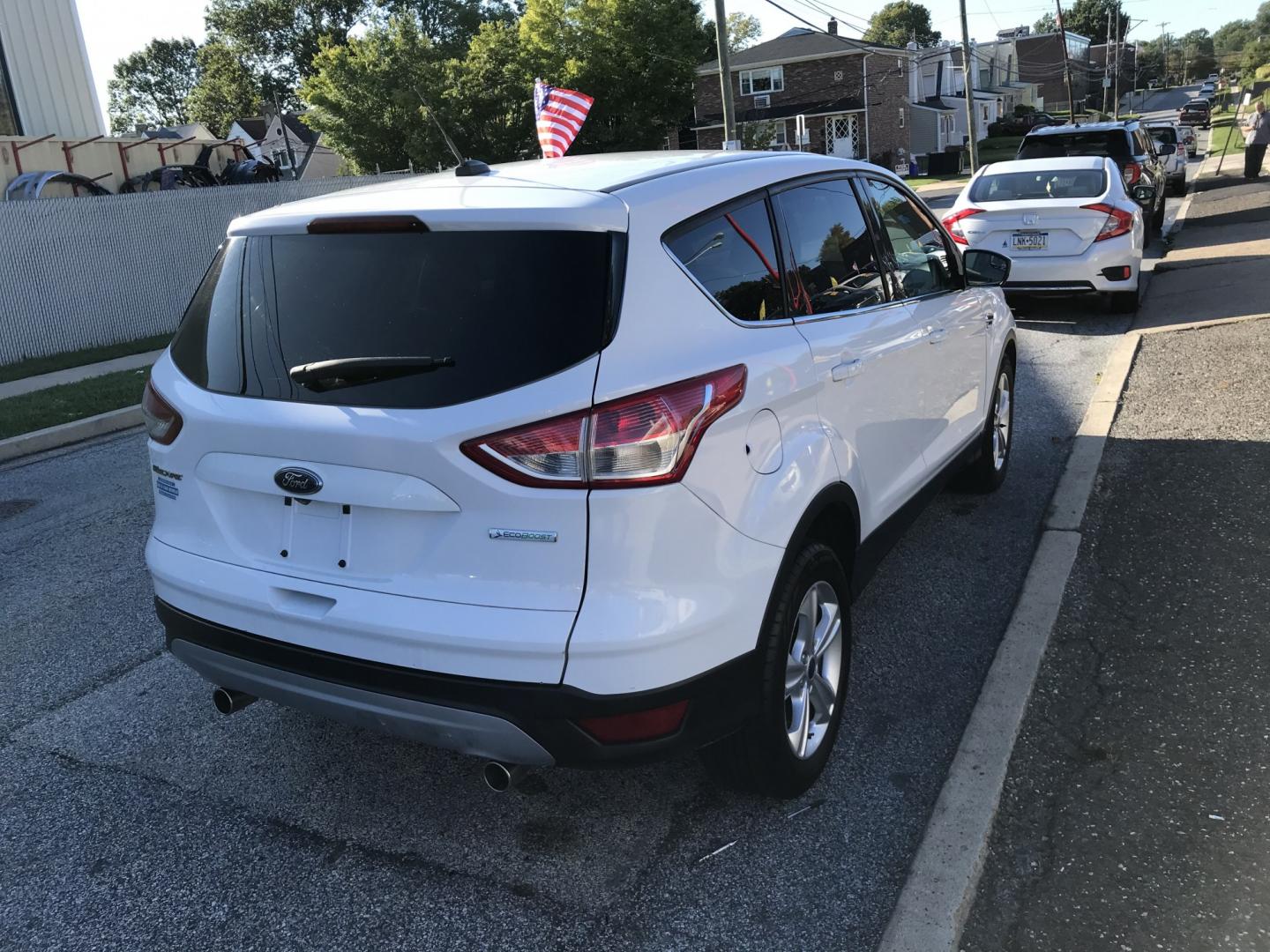 2014 White /Gray Ford Escape SE (1FMCU0GXXEU) with an 1.6L L4 DOHC 16V engine, 6-Speed Automatic transmission, located at 577 Chester Pike, Prospect Park, PA, 19076, (610) 237-1015, 39.886154, -75.302338 - 2014 Ford Escape SE: backup camera, new PA inspection, SUPER CLEAN, runs LIKE NEW! This vehicle comes inspected and has been given a bumper to bumper safety check. It is very clean, reliable, and well maintained. We offer a unique pay plan that is known for being the easiest and fastest financing- Photo#4