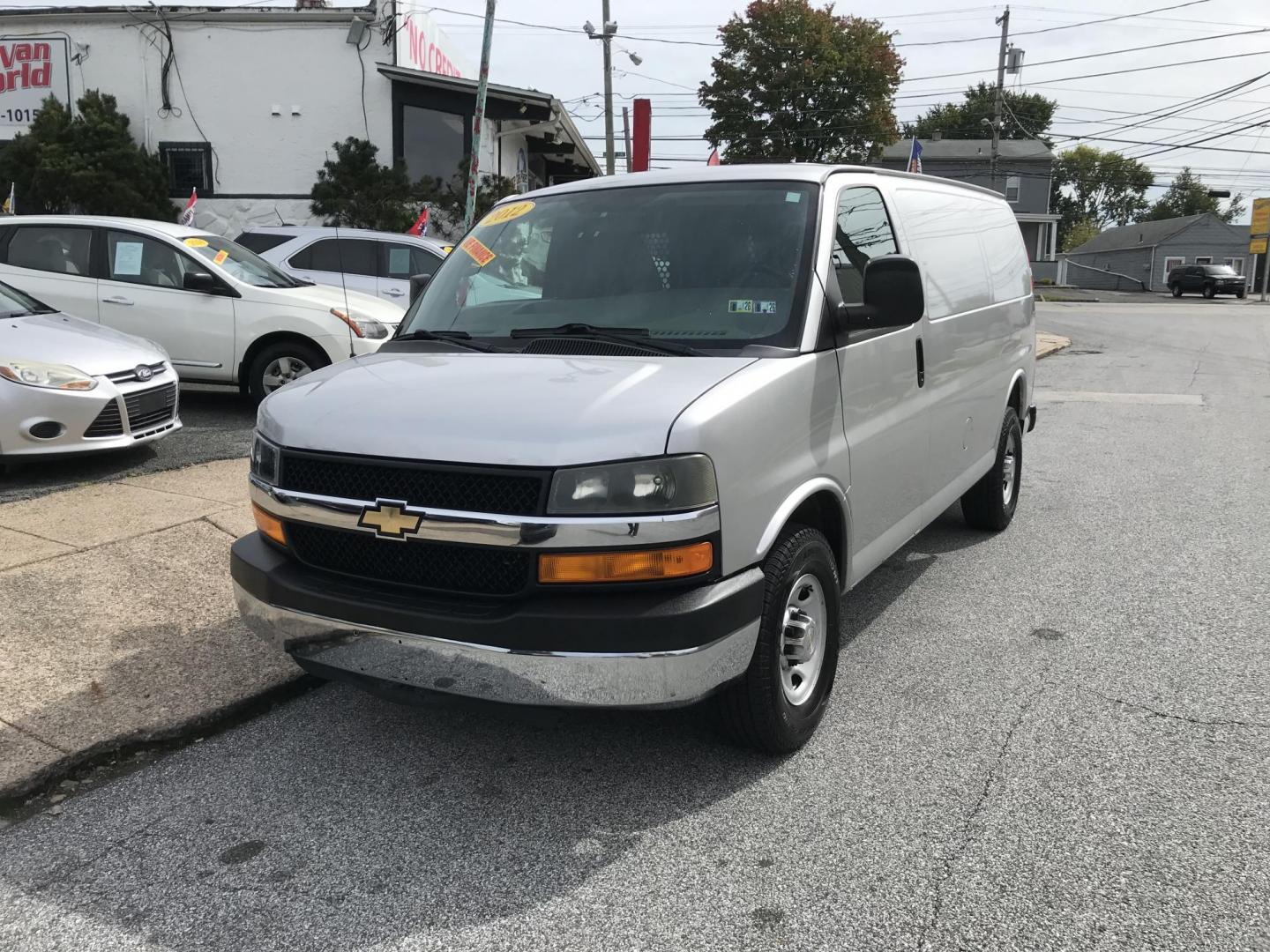 2012 Silver /Gray Chevrolet Express 2500 Cargo (1GCWGFCA2C1) with an 4.8L V8 OHV 16V FFV engine, 6-Speed Automatic transmission, located at 577 Chester Pike, Prospect Park, PA, 19076, (610) 237-1015, 39.886154, -75.302338 - 2012 Chevrolet Express 2500 Cargo Van: Multiple pieces of shelving, partition, new PA inspection, runs LIKE NEW! This vehicle comes inspected and has been given a bumper to bumper safety check. It is very clean, reliable, and well maintained. We offer a unique pay plan that is known for being the - Photo#2