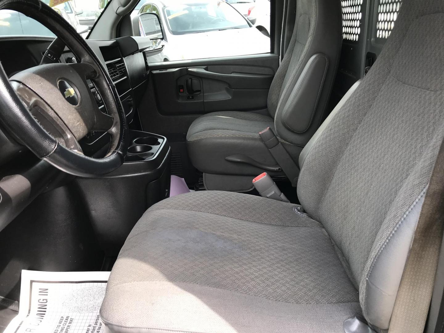 2012 Silver /Gray Chevrolet Express 2500 Cargo (1GCWGFCA2C1) with an 4.8L V8 OHV 16V FFV engine, 6-Speed Automatic transmission, located at 577 Chester Pike, Prospect Park, PA, 19076, (610) 237-1015, 39.886154, -75.302338 - 2012 Chevrolet Express 2500 Cargo Van: Multiple pieces of shelving, partition, new PA inspection, runs LIKE NEW! This vehicle comes inspected and has been given a bumper to bumper safety check. It is very clean, reliable, and well maintained. We offer a unique pay plan that is known for being the - Photo#8