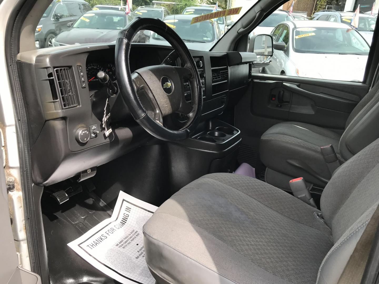2012 Silver /Gray Chevrolet Express 2500 Cargo (1GCWGFCA2C1) with an 4.8L V8 OHV 16V FFV engine, 6-Speed Automatic transmission, located at 577 Chester Pike, Prospect Park, PA, 19076, (610) 237-1015, 39.886154, -75.302338 - 2012 Chevrolet Express 2500 Cargo Van: Multiple pieces of shelving, partition, new PA inspection, runs LIKE NEW! This vehicle comes inspected and has been given a bumper to bumper safety check. It is very clean, reliable, and well maintained. We offer a unique pay plan that is known for being the - Photo#7