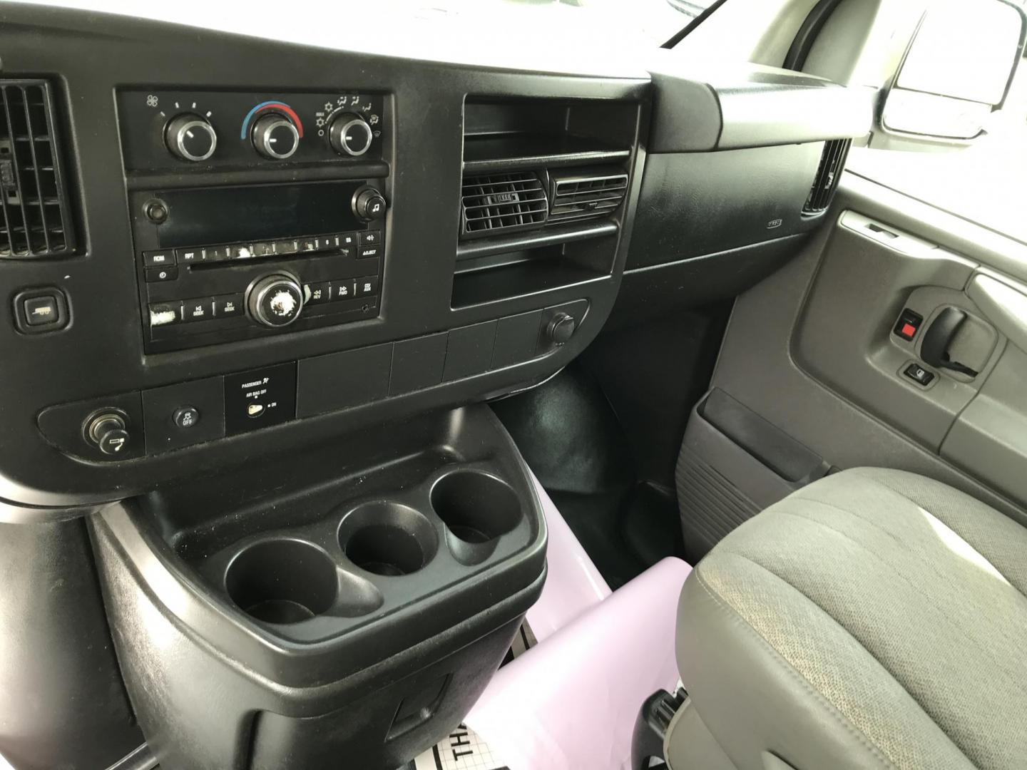 2012 Silver /Gray Chevrolet Express 2500 Cargo (1GCWGFCA2C1) with an 4.8L V8 OHV 16V FFV engine, 6-Speed Automatic transmission, located at 577 Chester Pike, Prospect Park, PA, 19076, (610) 237-1015, 39.886154, -75.302338 - 2012 Chevrolet Express 2500 Cargo Van: Multiple pieces of shelving, partition, new PA inspection, runs LIKE NEW! This vehicle comes inspected and has been given a bumper to bumper safety check. It is very clean, reliable, and well maintained. We offer a unique pay plan that is known for being the - Photo#12