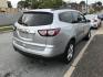 2013 Silver /Black Chevrolet Traverse LTZ AWD (1GNKVLKD3DJ) with an 3.6L V6 DOHC 24V engine, 6-Speed Automatic transmission, located at 577 Chester Pike, Prospect Park, PA, 19076, (610) 237-1015, 39.886154, -75.302338 - Photo#4