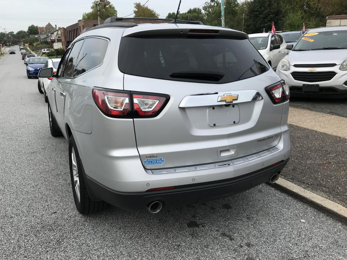 2013 Silver /Black Chevrolet Traverse LTZ AWD (1GNKVLKD3DJ) with an 3.6L V6 DOHC 24V engine, 6-Speed Automatic transmission, located at 577 Chester Pike, Prospect Park, PA, 19076, (610) 237-1015, 39.886154, -75.302338 - Photo#5