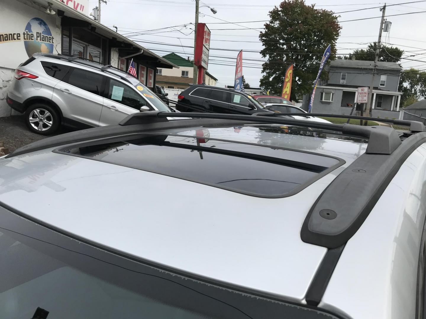 2013 Silver /Black Chevrolet Traverse LTZ AWD (1GNKVLKD3DJ) with an 3.6L V6 DOHC 24V engine, 6-Speed Automatic transmission, located at 577 Chester Pike, Prospect Park, PA, 19076, (610) 237-1015, 39.886154, -75.302338 - Photo#8