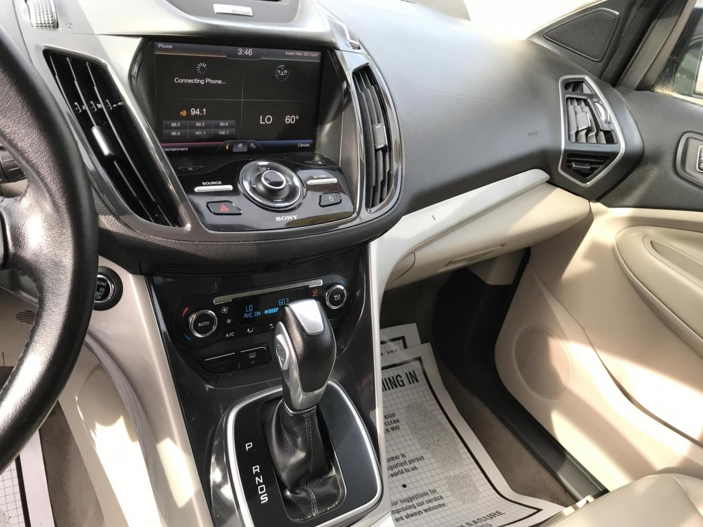 2013 Black /Tan Ford Escape SEL 4WD (1FMCU9H98DU) with an 2.0L L4 DOHC 16V engine, 6-Speed Automatic transmission, located at 577 Chester Pike, Prospect Park, PA, 19076, (610) 237-1015, 39.886154, -75.302338 - Photo#13