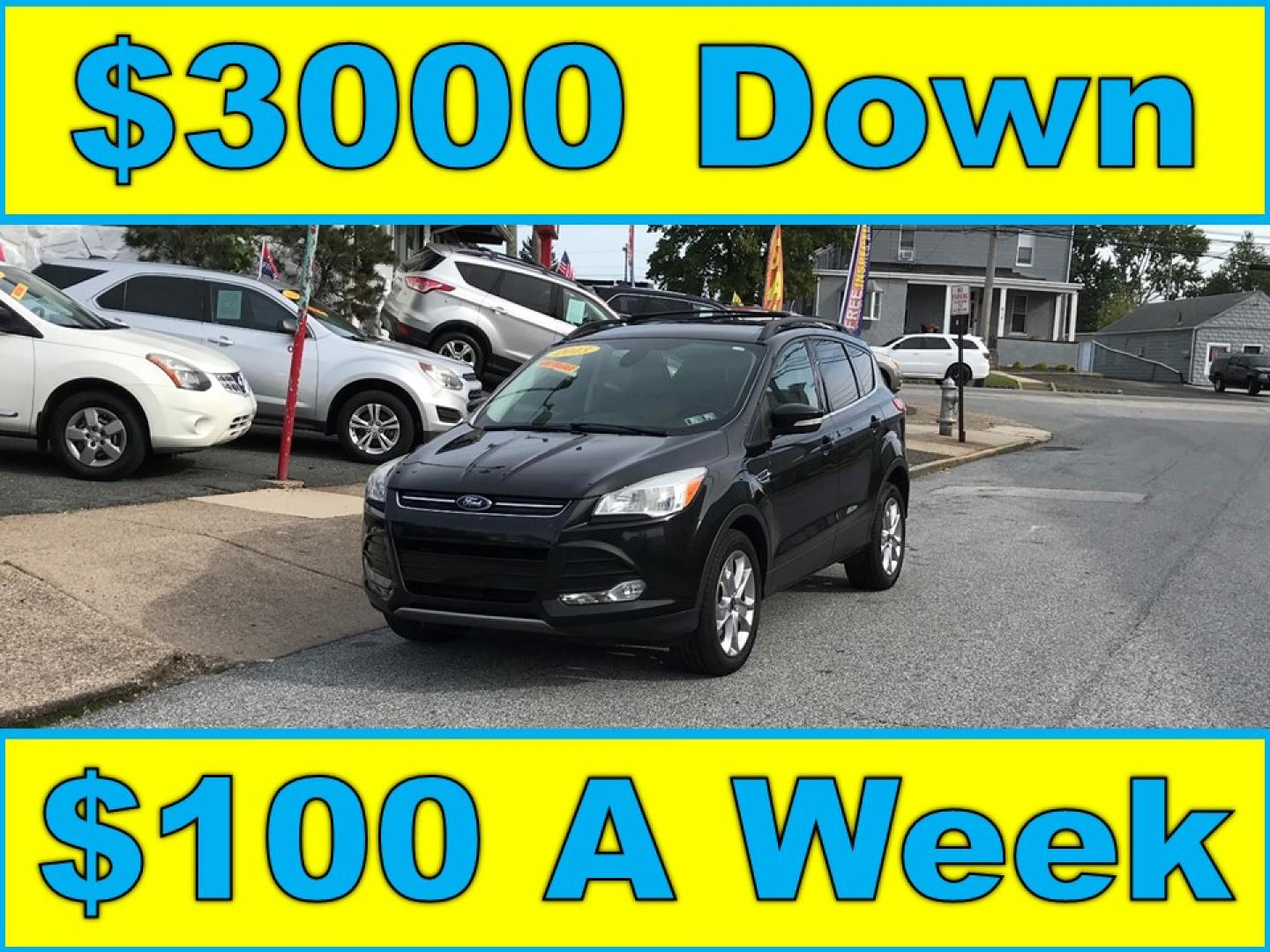 2013 Black /Tan Ford Escape SEL 4WD (1FMCU9H98DU) with an 2.0L L4 DOHC 16V engine, 6-Speed Automatic transmission, located at 577 Chester Pike, Prospect Park, PA, 19076, (610) 237-1015, 39.886154, -75.302338 - Photo#0