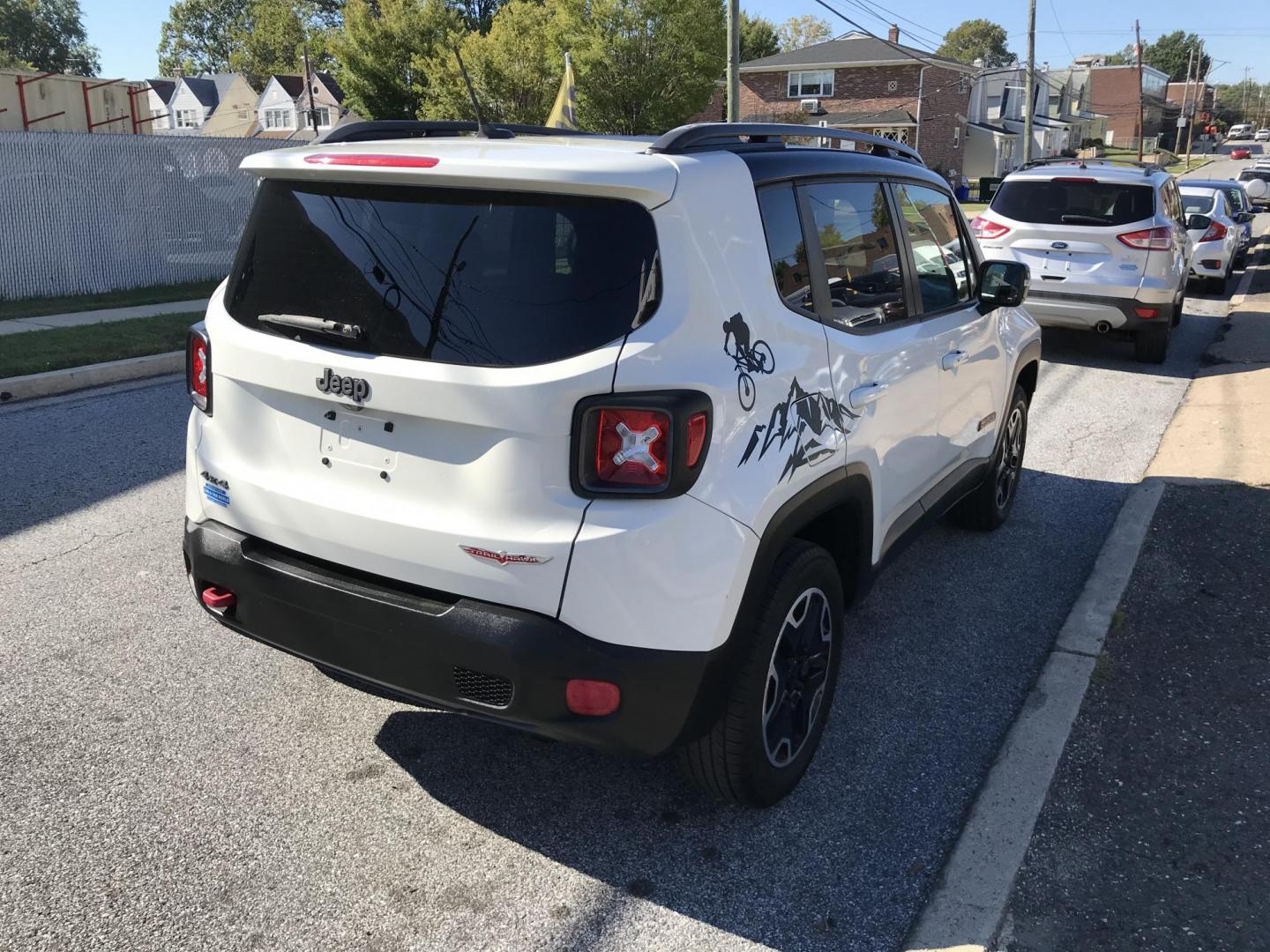 2015 White /Black Jeep Renegade Trailhawk (ZACCJBCT2FP) with an 2.4L L4 engine, 9-Speed Automatic transmission, located at 577 Chester Pike, Prospect Park, PA, 19076, (610) 237-1015, 39.886154, -75.302338 - 2015 Jeep Renegade Trailhawk: Only 123k miles, navigation system, backup camera, new PA inspection, SUPER CLEAN, runs LIKE NEW! vehicle comes inspected and has been given a bumper to bumper safety check. It is very clean, reliable, and well maintained. We offer a unique pay plan that is known fo - Photo#4